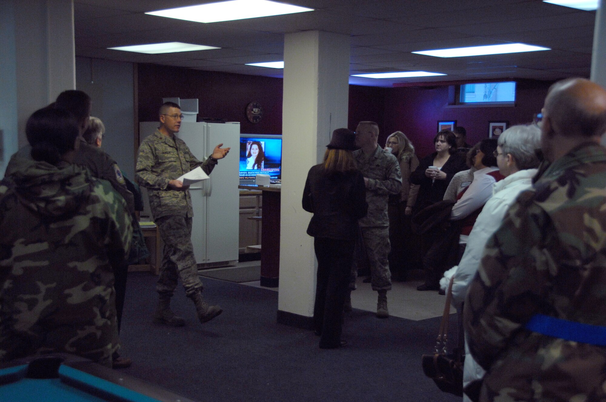 EIELSON AIR FORCE BASE, Alaska -- Chap. (Maj.) Patrick Genseal, 354th Fighter Wing chaplain, explains to the participators of the Leadership Symposium how the Chapel Caf? operates and what it offers Eielson's unaccompanied Airmen Nov. 16, 2007.  The Leadership Symposium is held once a year offering insight to commanders, chiefs, and their spouses on the roles of different organizations of the 354th Fighter Wing and the purpose they serve. (U.S. Air Force photo by Airman 1st Class Christopher Griffin)