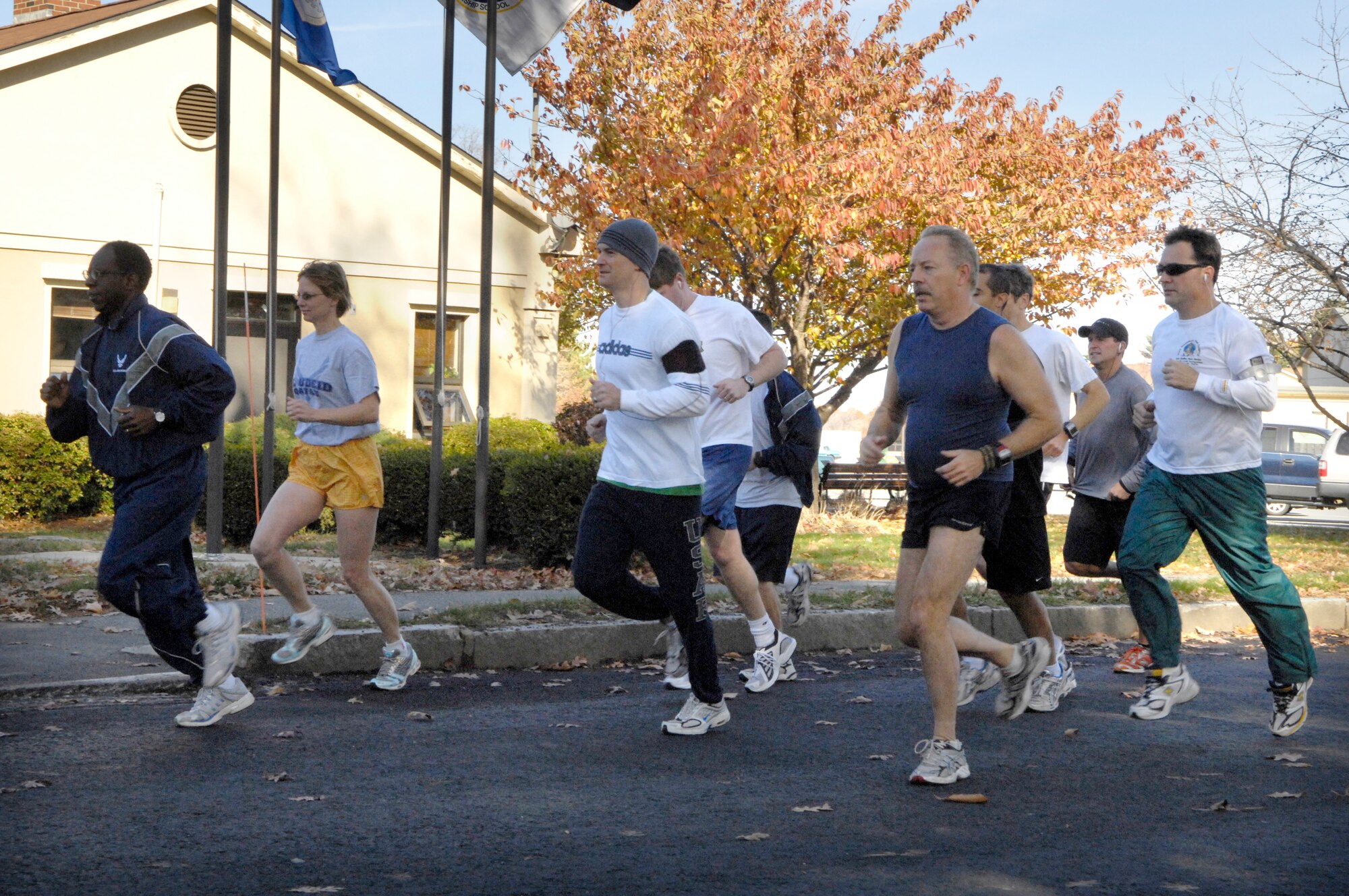 HANSCOM AFB, Mass. – Hanscom runners enjoy the sunny autumn weather while participating in the Fitness and Sports Center’s Pilgrim’s Parade Fun Run Nov. 14. In the male category, Erik Duerr, MIT Lincoln Lab, placed first with a time of 18:52. Joe Fischetti, MIT Lincoln Lab, and Capt. David Jarvis, 652nd Electronic Systems Squadron, followed with the times 19:13 and 21:11 respectively. Susan Miller, 652 ELSS, finished with a time of 28:20 in the female category. For more information on upcoming Fitness and Sports Center events and classes, visit www.hanscomservices.com/FitnessandSportsCenter.html. (U.S. Air Force photos by Mark Wyatt.) 

