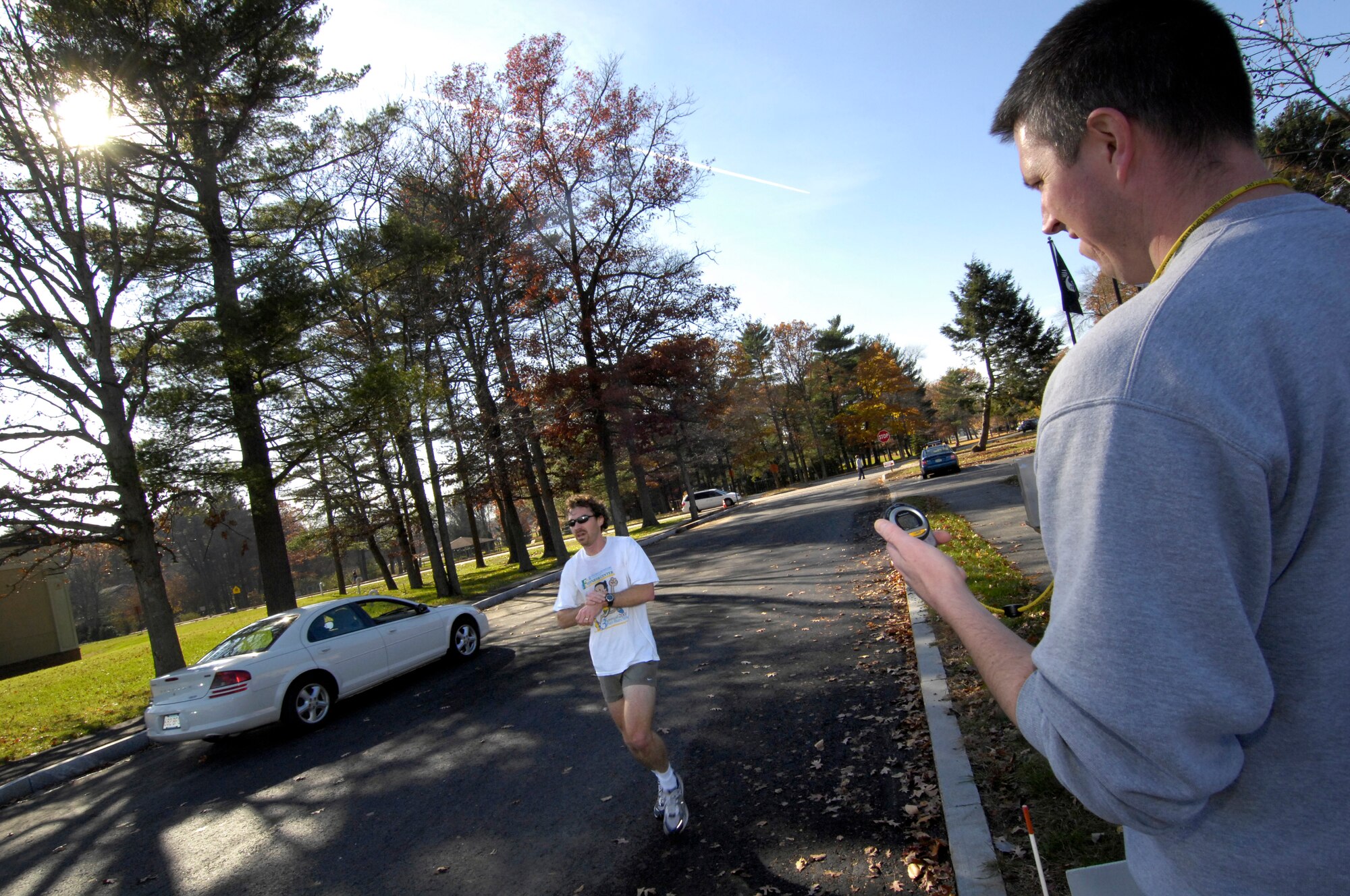 HANSCOM AFB, Mass. – Hanscom runners enjoy the sunny autumn weather while participating in the Fitness and Sports Center’s Pilgrim’s Parade Fun Run Nov. 14. In the male category, Erik Duerr, MIT Lincoln Lab, placed first with a time of 18:52. Joe Fischetti, MIT Lincoln Lab, and Capt. David Jarvis, 652nd Electronic Systems Squadron, followed with the times 19:13 and 21:11 respectively. Susan Miller, 652 ELSS, finished with a time of 28:20 in the female category. For more information on upcoming Fitness and Sports Center events and classes, visit www.hanscomservices.com/FitnessandSportsCenter.html. (U.S. Air Force photos by Mark Wyatt.) 

