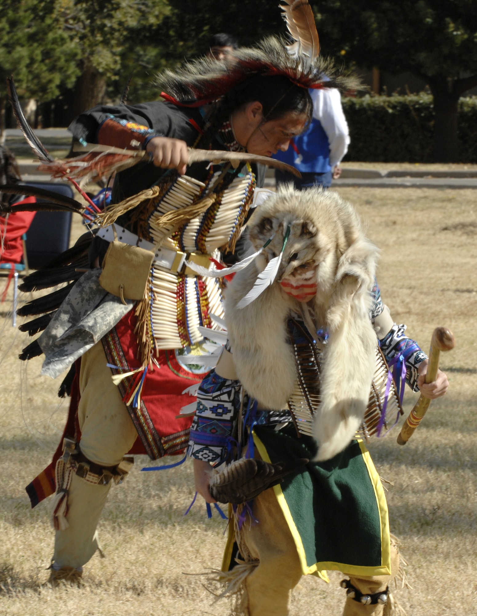 Altus Air Force Base, Okla. -- From left, Jaydon Ice and Jordan Ice perform a ceremonial dance during the American Indian and Alaskan Native Heritage Celebration Pow Wow Nov. 7 at the parade grounds on base. The Pow Wow was the first to be held on base. (U.S. Air Force photo by Senior Airman Joshua DeMotts)