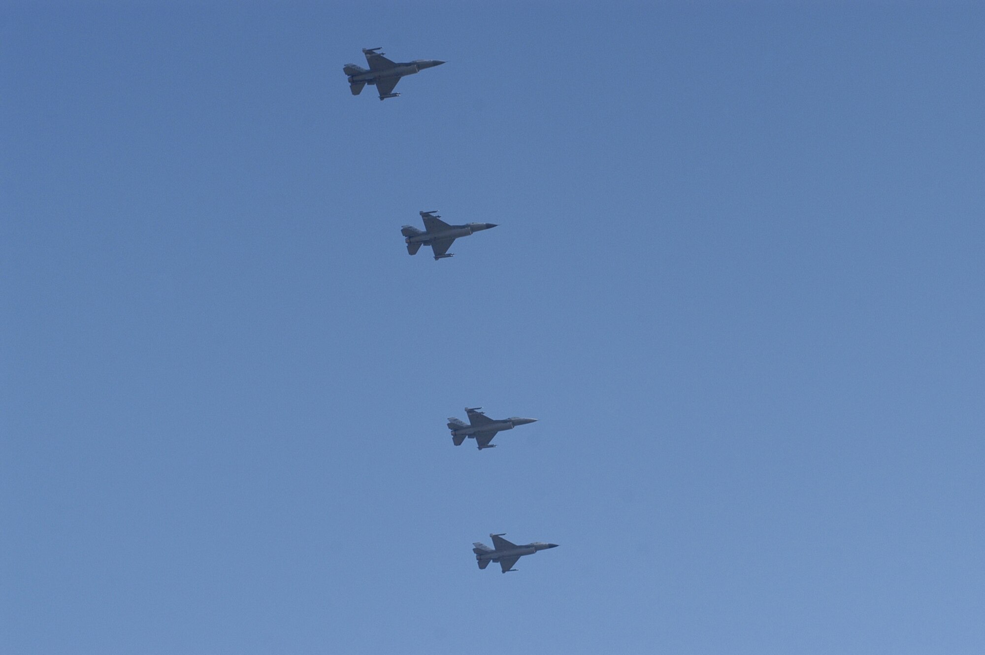 93rd Fighter Squadron pilots perform a flyover of Homestead-Miami Speedway as the conclusion of the national anthem before the NASCAR NEXTEL Cup Series season-ending Ford 400 race. (U.S. Air Force photo/Senior Airman Erik Hofmeyer)