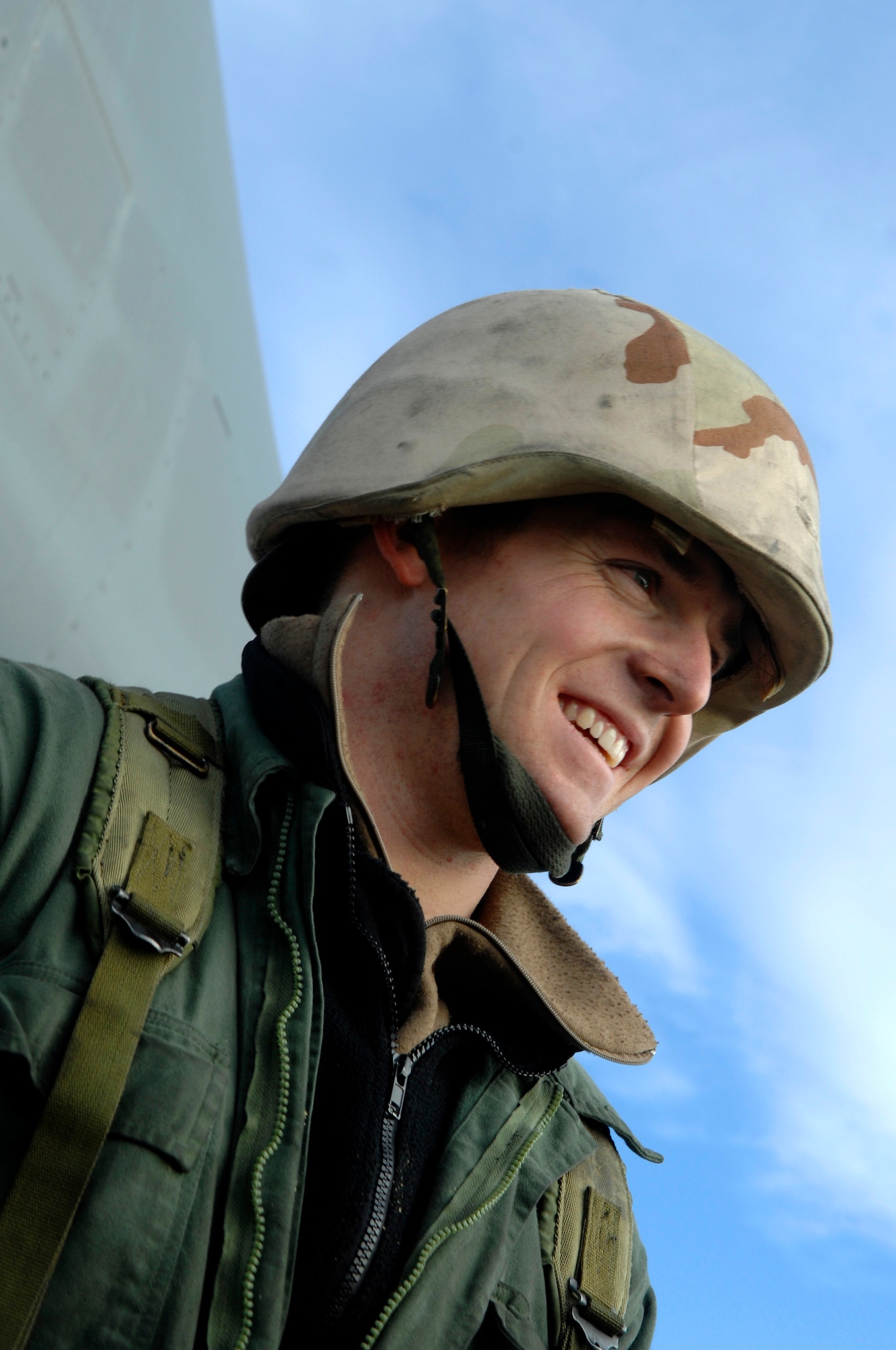 U.S. Air Force Senior Airman Courtney Armstrong, from the 28th Aircraft Maintenance Squadron, is happy at the positive feedback he got after his B-1B Lancer was thoroughly inspected during Operational Readiness Inspection (ORI) Coronet White 07-ACC-12 at Ellsworth Air Force Base, S.D., Nov. 17, 2007.  An Air Combat Command inspection team will use this ORI to evaluate Ellsworth's ability to effectively and rapidly deploy.  (U.S. Air Force photo by SSgt Michael B. Keller)(Released)