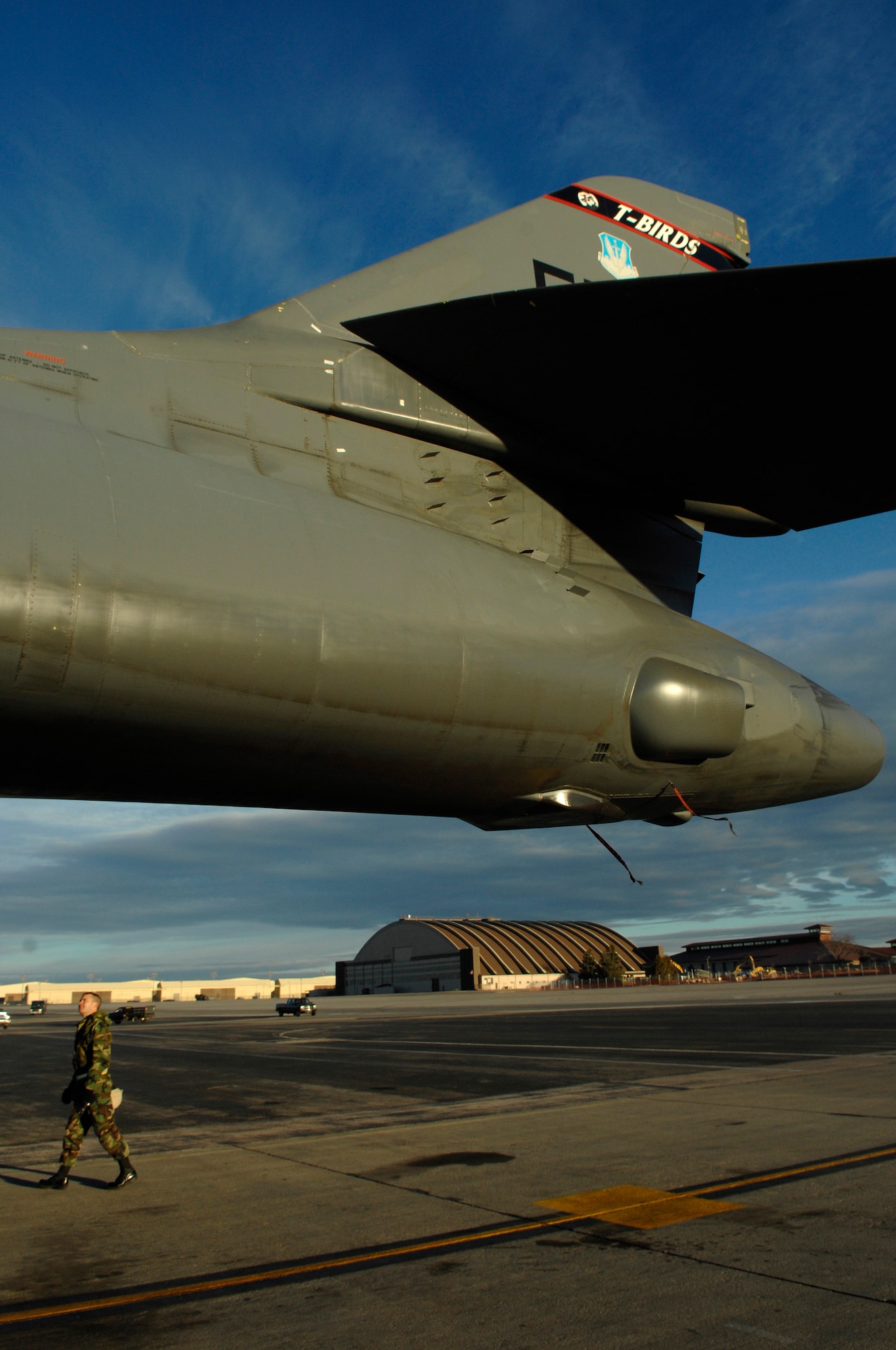 U.S. Air Force 1st Lt. Wilburn Poe, from the 28th Aircraft Maintenance Squadron, checks the tail section of a B-1B Lancer prior to the aircraft being inspected during Operational Readiness Inspection (ORI) Coronet White 07-ACC-12 at Ellsworth Air Force Base, S.D., Nov. 17, 2007.  An Air Combat Command inspection team will use this ORI to evaluate Ellsworth's ability to effectively and rapidly deploy.  (U.S. Air Force photo/Staff Sgt. Michael B. Keller)