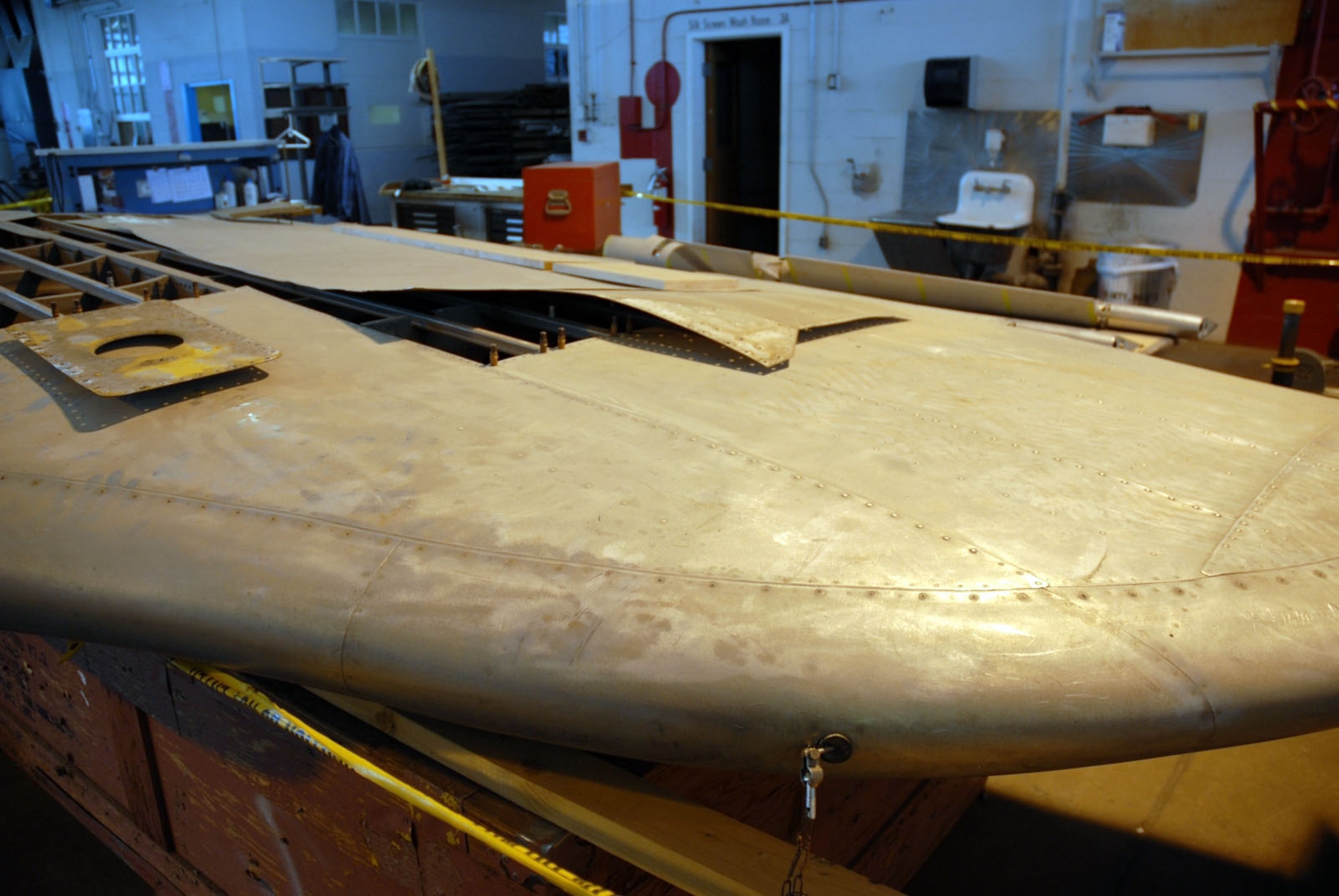 DAYTON, Ohio (11/2007) -- A section of the wing from the "Memphis Belle" in the restoration area of the National Museum of the United States Air Force. (U.S. Air Force photo)