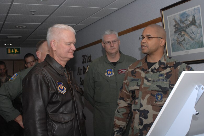 Lt. Gen. Rod Bishop, 3rd Air Force commander (left) is briefed by Master Sgt. Russell Anderson, 100th Operations Support Squadron, on the unit's Air Force Smart Operations for the 21st Century initives. The general toured units at RAF Mildenhall during a visit Nov. 7. (U.S. Air Force photo by Airman 1st Class Brad Smith) 