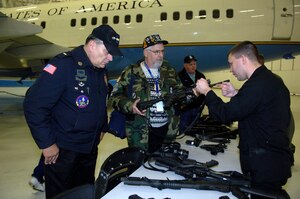 Staff Sgt. David N. Wood, 316th Security Forces Emergency Service Team, demonstrates asp techniques during the Vietnam Veterans visit on Nov. 9. Hangar three events included lunch, static displays, canine tactics demo, a vehicle assault and officer recovery scenario, and Raven capabilites demonstration.(US Air Force/A1C Renae Kleckner)