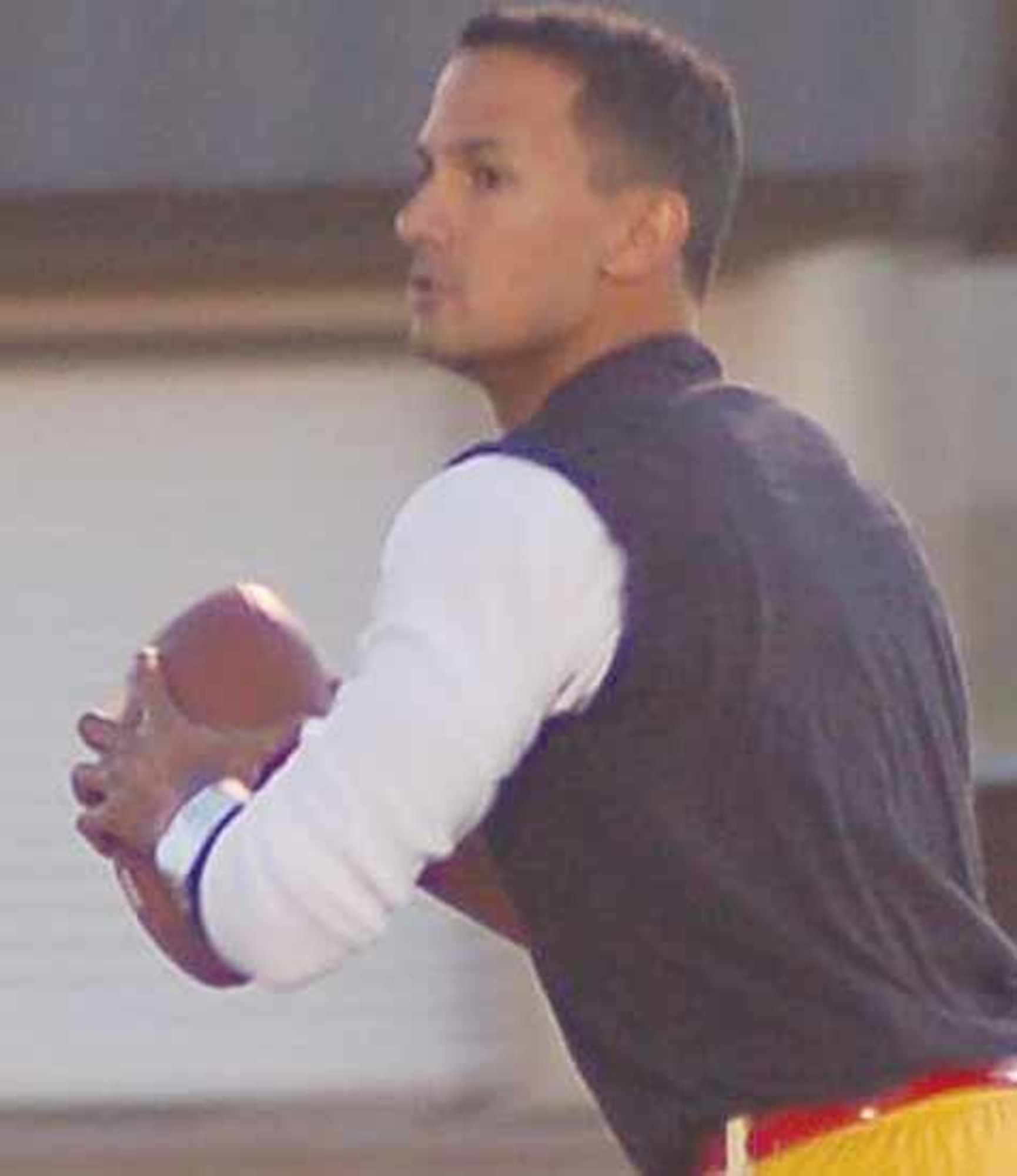 Dave Kelley, quarterback for the 960th Airborne Air Control Squadron Vikings, drops back for a pass during the 2007 Flag Football Championship game Nov. 15. The Vikings beat Tinker Eye Care 16-13 to claim the title. (Air Force photo by John E. Banks) 