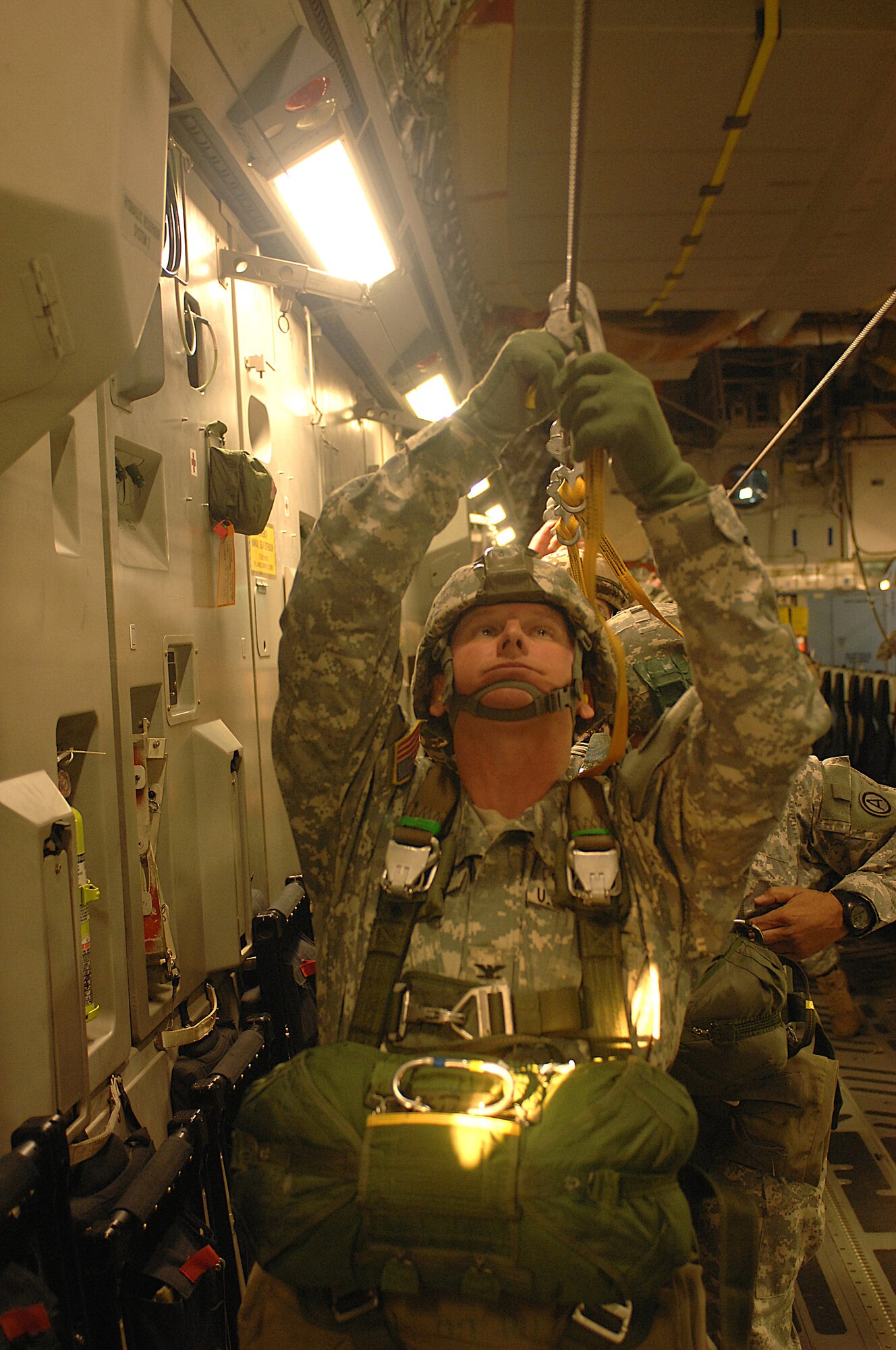 U.S. Army paratroopers from the 20th Engineering Brigade, 101st Airborne Division, Fort Campbell, Ky., clip onto a static line inside a Charleston AFB C-17 aircraft for an air drop into Cairo, Egypt, Nov. 10 as part of Exercise Bright Star 2007. (U.S Air Force photo/Staff Sgt. Aaron Allmon)