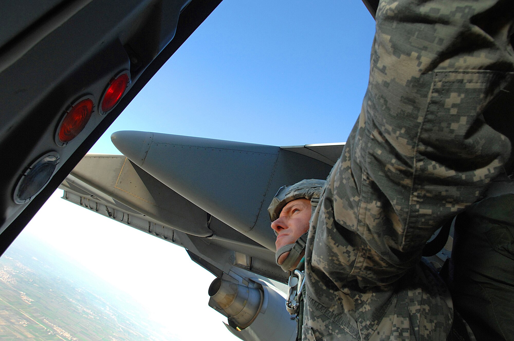 A U.S. Army paratrooper from the 20th Engineering Brigade, 101st Airborne Division, Fort Campbell, Ky., prepares to parachute from a Charleston AFB C-17 into Cairo, Egypt, Nov. 7 as part of Exercise Bright Star 2007. (U.S Air Force photo/Staff Sgt. Aaron Allmon)