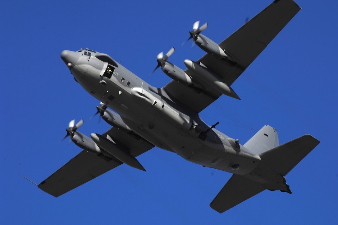 An AC-130H gunship flies over Hurlburt Field Nov. 15, 2007. The AC-130 gunship's primary missions are close air support, air interdiction and force protection. These heavily armed aircraft incorporate side-firing weapons integrated with sophisticated sensor, navigation and fire control systems to provide surgical firepower or area saturation during extended loiter periods, at night and in adverse weather. (U.S. Air Force Photo/Senior Airman Stephanie Jacobs)