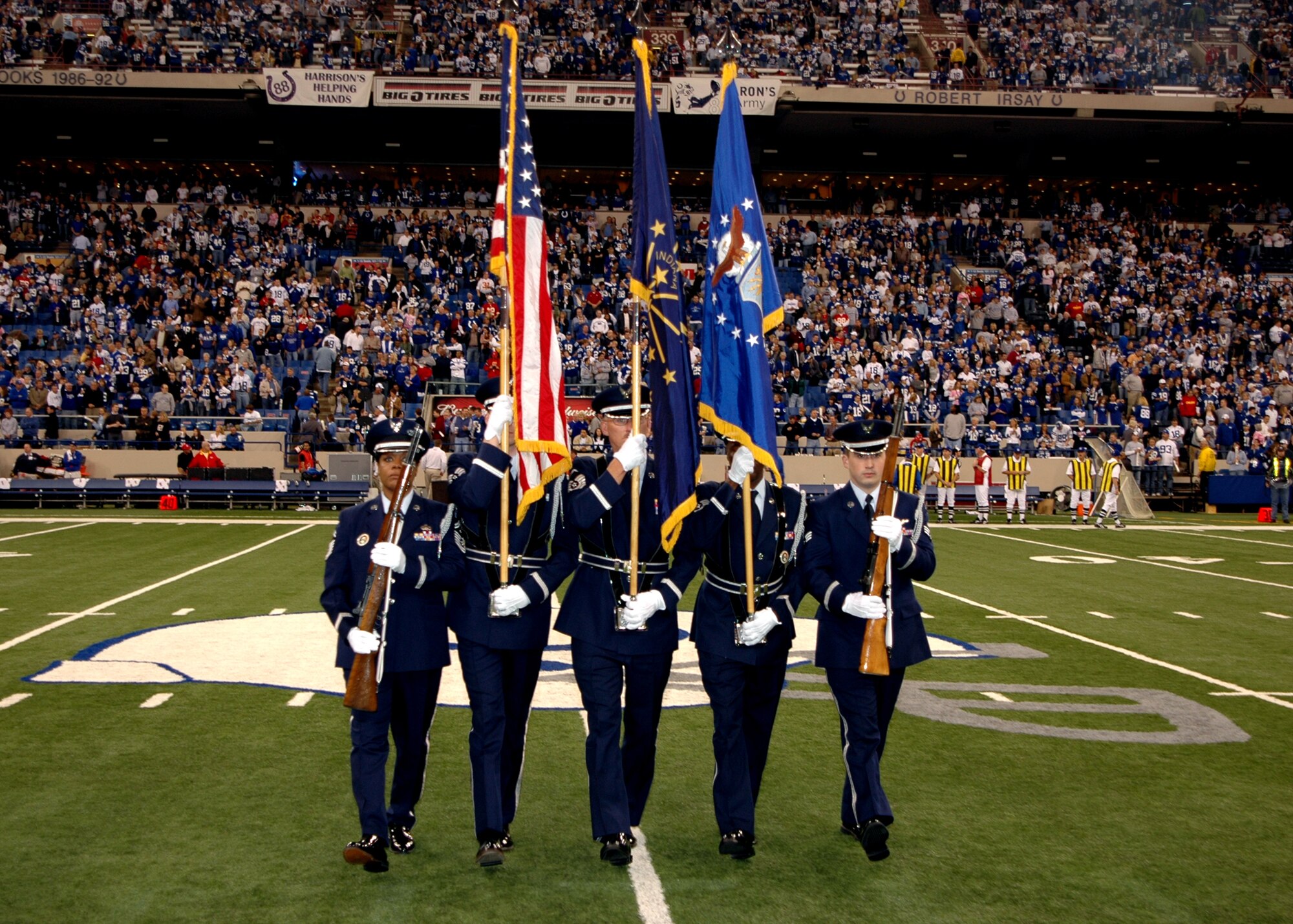 GRISSOM AIR RESERVE BASE, Ind., -- The Grissom Honor Guard presented the colors before the Indianapolis Colts game Nov. 18. The honor guard was represented by  Senior Master Sgt. Linda Mason, 74th Air Refueling Squadron First Sgt.; Staff Sgt. Ben Durr, 434th Security Forces Squadron; Master Sgt. Timothy Wood, 434th Services Flight; Master Sgt. Donald Mason, retired; and Senior Airman Josh Fagerburg, 74th ARS boom operator. The honor guard portrays the core values of Integrity First, Service Before Self and Excellence in All We Do. (U.S. Air Force photo/ Senior Airman Carl Berry)