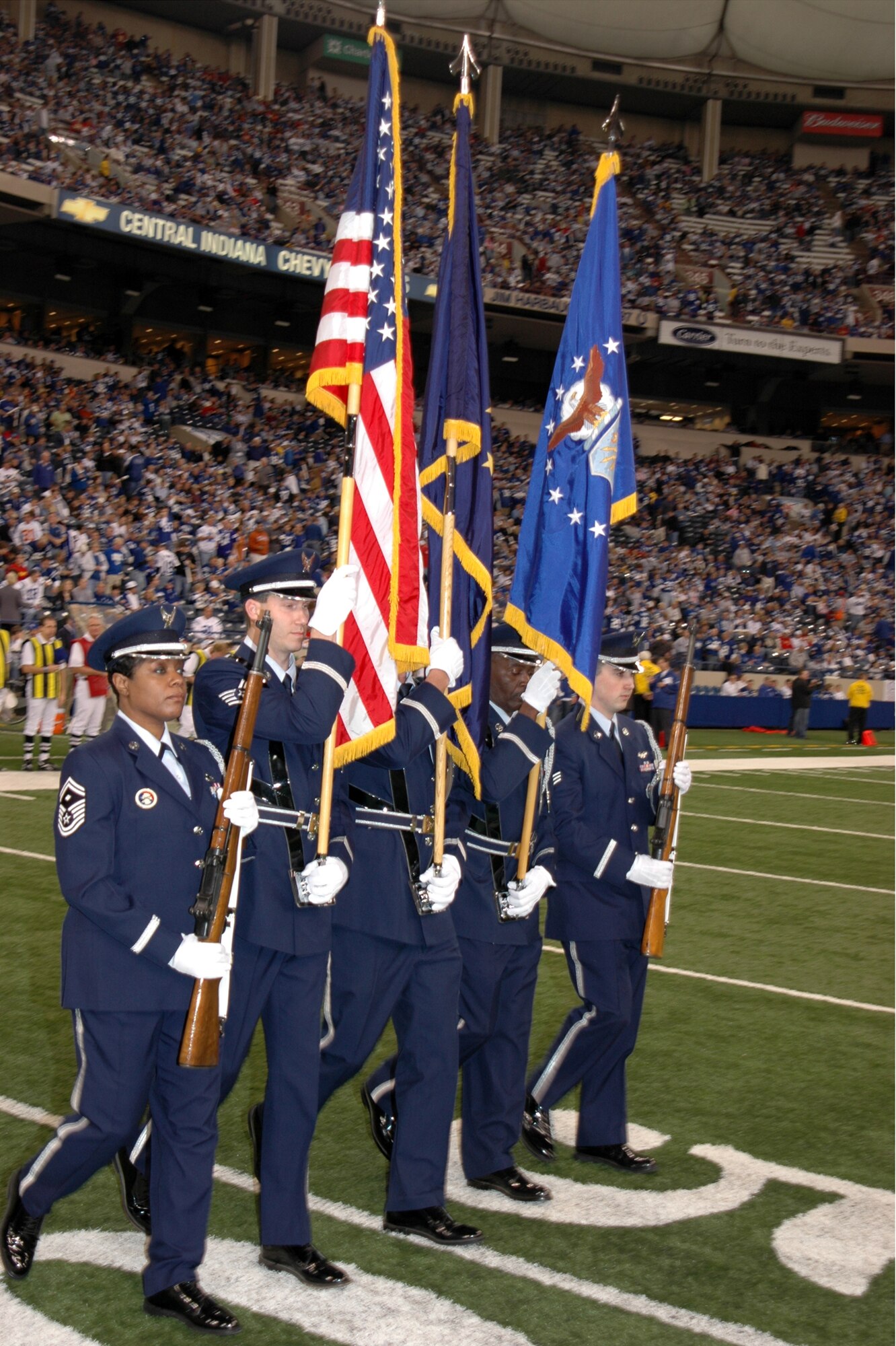 GRISSOM AIR RESERVE BASE, Ind., -- Members of the Grissom Honor Guard presented the colors before the Indianapolis Colts game Nov. 18. The honor guard prides itself on the core value of excellence in all we do. Representing the Grissom Honor Guard were Senior Master Sgt. Linda Mason, 74th Air Refueling Squadron First Sgt.; Staff Sgt. Ben Durr, 434th Security Forces Squadron; Master Sgt. Timothy Wood, 434th Services Flight; Master Sgt. Donald Mason, retired; and Senior Airman Josh Fagerburg, 74th ARS boom operator. (U.S. Air Force photo/Senior Airman Carl Berry)