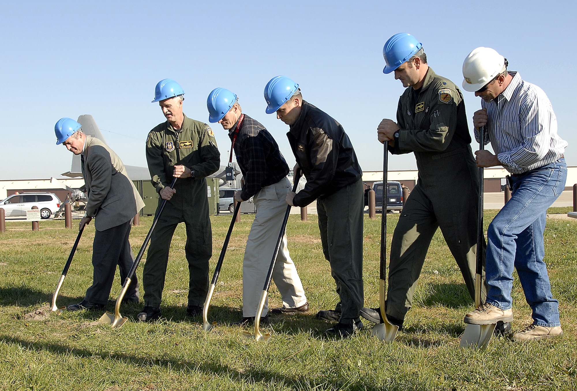 442nd Fighter Wing commander, Col. Steve Arthur, second from left, leads the groundbreaking for a new operations building for the wing's 303rd Fighter Squadron. Assisting Colonel Arthur were, from left, Bob Hagedorn, chief of staff for U.S. Congressman Ike Skelton; Steve Iverson, U.S. Army Corps of Engineers project manager;  Col. John Robinson, 509th Bomb Wing vice commander; Lt. Col. Mark Ernewein, 303rd Fighter Squadron commander; and Mitch Pinkham, ECI Construction,Mason and Hangar. The 442nd FW is an Air Force Reserve A-10 Thunderbolt II unit at Whiteman AFB, Mo. (US Air Force photo/Master Sgt. Bill Huntington)