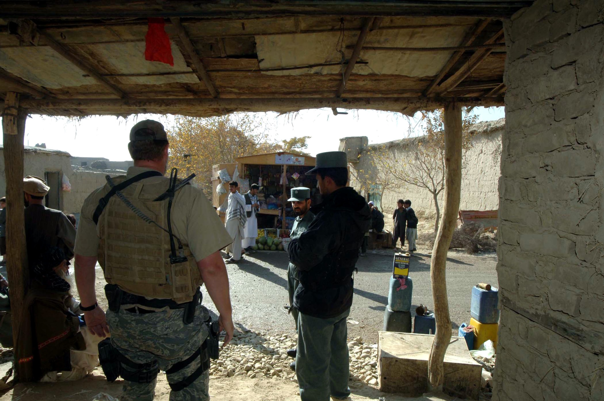 Afghan National Police members help provide security during a recent medical civil action project. The ANP is an essential partner in efforts to provide improved services and infrastructure to the country of Afghanistan. (U.S. Air Force photo/Staff Sgt. Mike Andriacco)