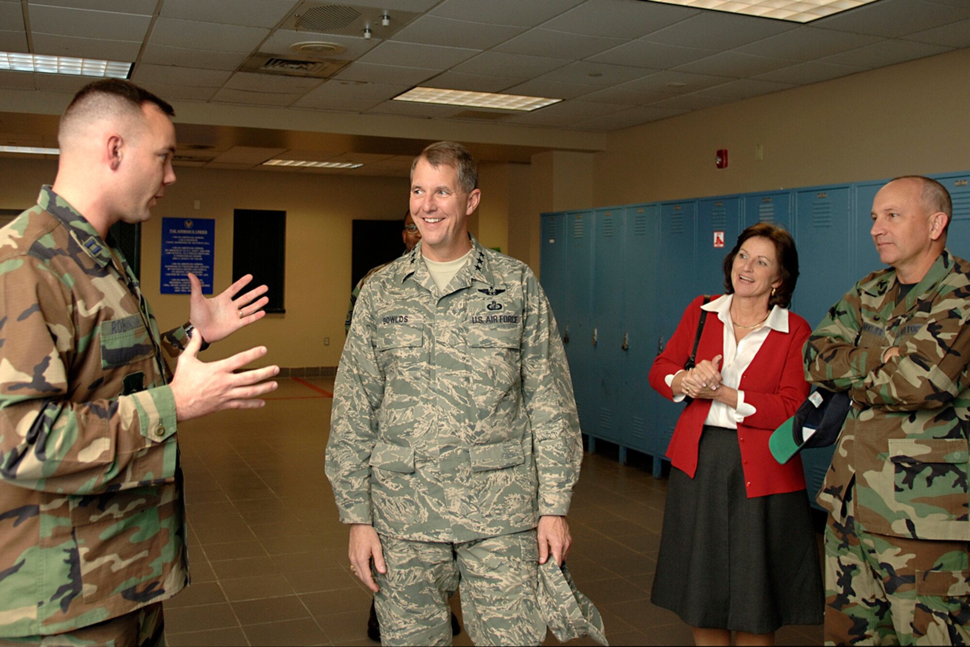HANSCOM AIR FORCE BASE, Mass. -- Electronic Systems Center Commander Lt. Gen. Ted Bowlds and his wife Marcia, along with Col. Robert Boyles, 66th Mission Support Group commander, listen as Capt. Christopher Robinson, 66th Security Forces Squadron Operations and Training officer, explains his unit’s mission during a visit to the squadron during a base orientation tour Nov. 16.  The general took command of ESC Nov. 7. (U.S. Air Force photo by Jan Abate)