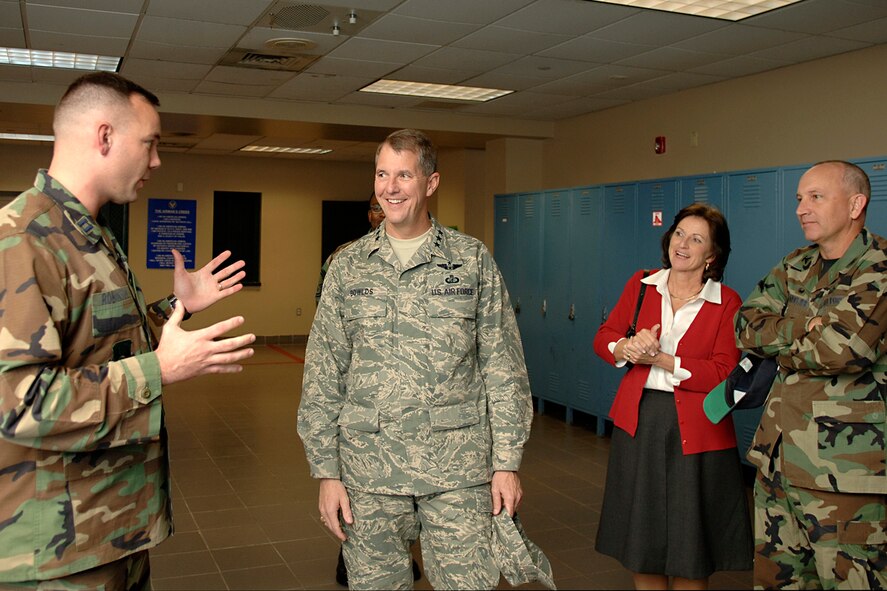 HANSCOM AIR FORCE BASE, Mass. -- Electronic Systems Center Commander Lt. Gen. Ted Bowlds and his wife Marcia, along with Col. Robert Boyles, 66th Mission Support Group commander, listen as Capt. Christopher Robinson, 66th Security Forces Squadron Operations and Training officer, explains his unit’s mission during a visit to the squadron during a base orientation tour Nov. 16.  The general took command of ESC Nov. 7. (U.S. Air Force photo by Jan Abate)