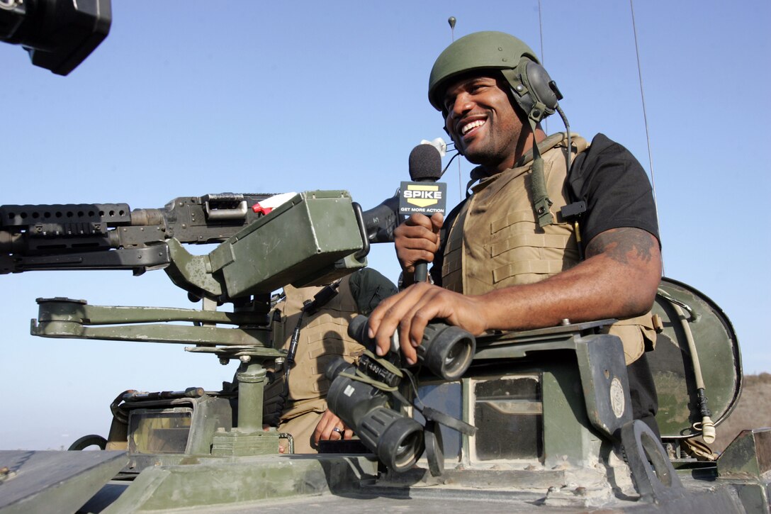 Ultimate Fighting Championship light heavyweight champion Quinton ?Rampage? Jackson does a television spot for Spike TV during a visit to the Marines of 1st Light Armored Reconnaissance at Camp Pendleton, Calif., Nov. 20. He also visited Marines from 1st Marine Division and Wounded Warriors Battalion West.