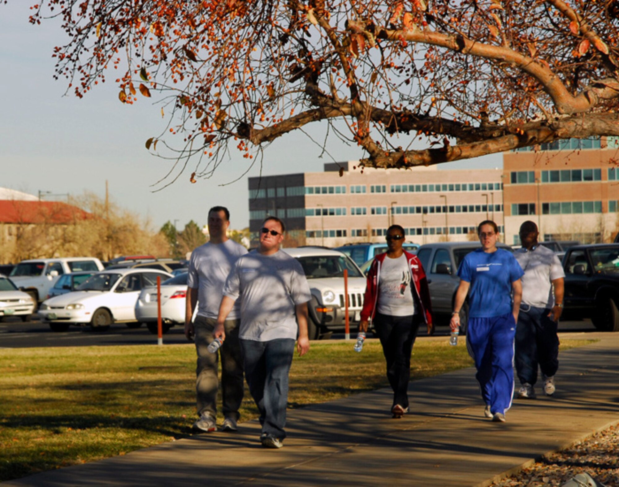 Employees from the Air Reserve Personnel Center walk in the Turkey Trot to raise funds for the ARPC Holiday Party. The event took walkers through Denver's historic Montclair neighborhood. (U.S. Air Force photo/Ellen Edwards)