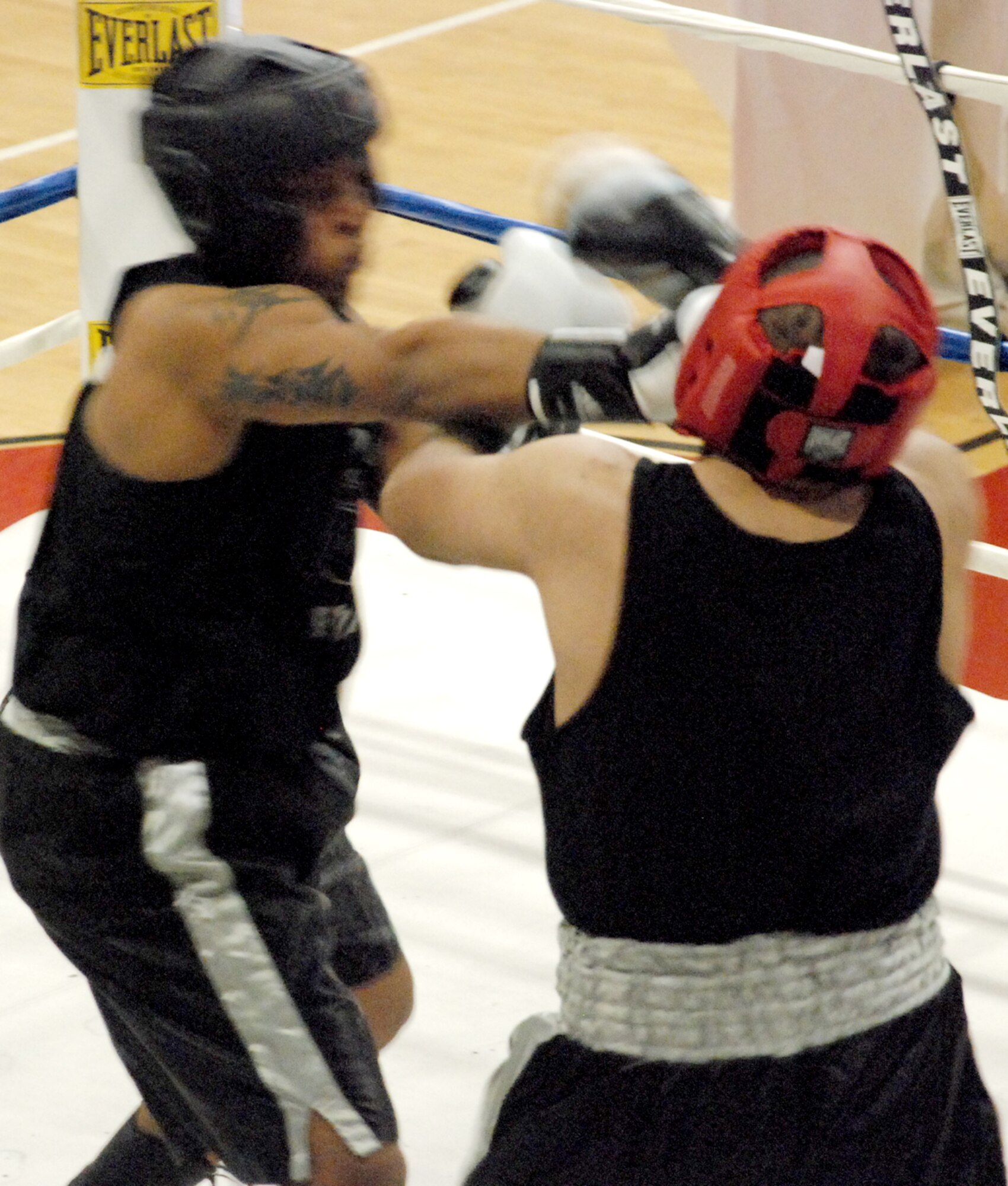 Airman 1st Class Freddy Noriega, 21st Medical Group, and J.J. Diaz, 21st Space Wing, both from Peterson Air Force Base, Colol., battled in the exhibition Nov. 10.