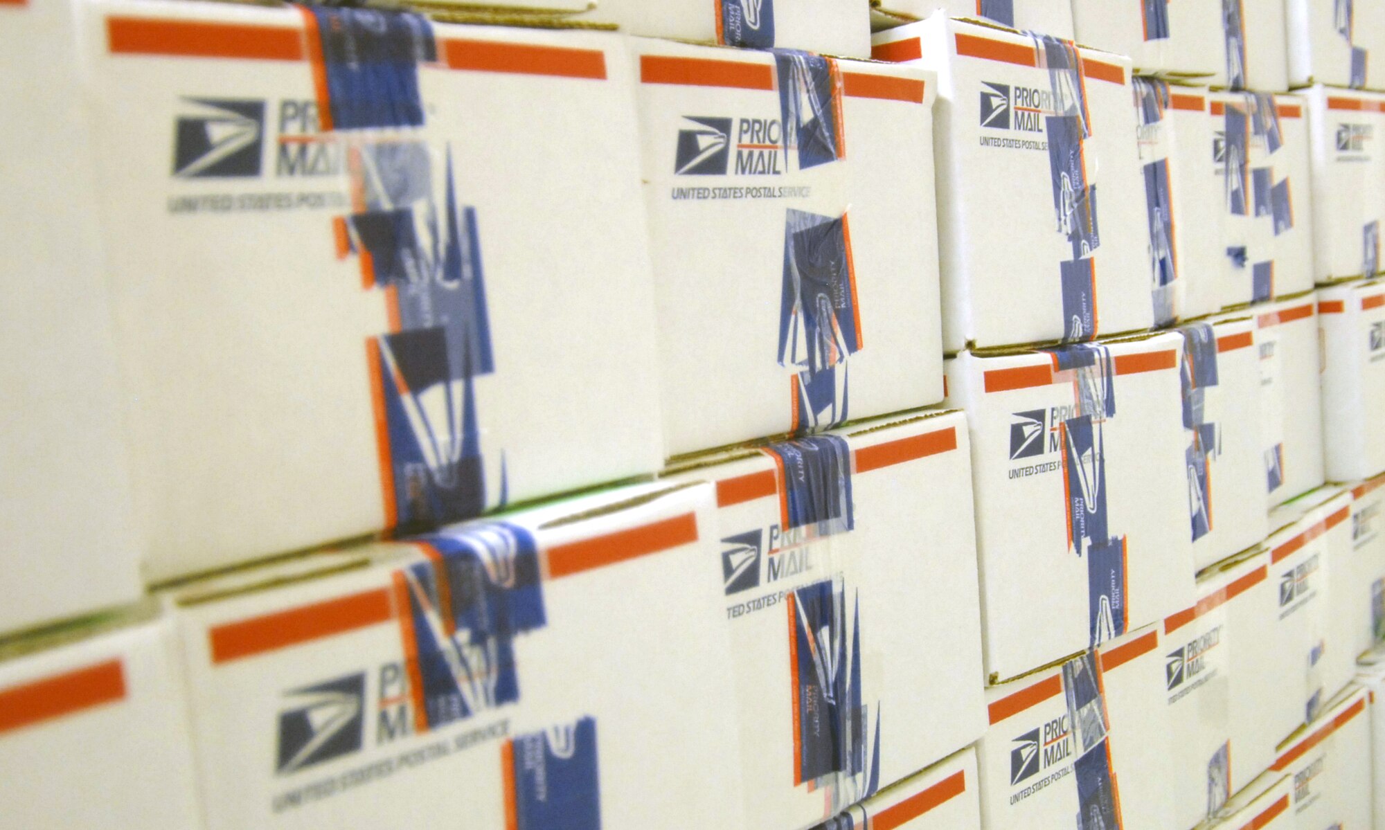 Eighty-two care packages were packed Nov. 20 at building 2600 here during the Operation Touch Our Warriors II processing. Items collected for deployed troops ranged from energy drinks and cookies to DVDs and games. (Photo by Senior Airman Julius Delos Reyes)