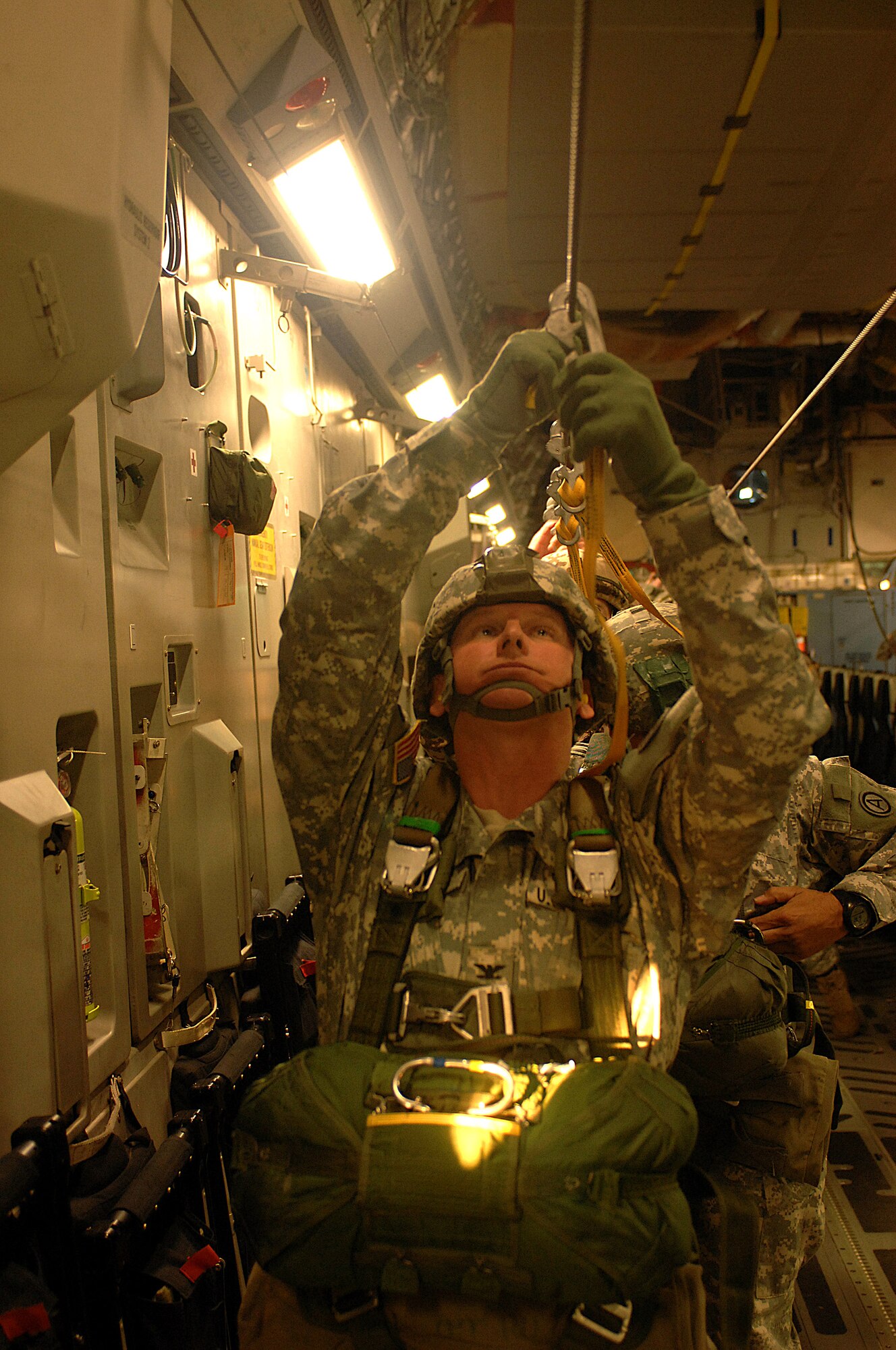 Army paratroopers from the 20th Engineering Brigade, 101st Airborne Division, Fort Campbell, Ky., clip onto a static line inside a C-17 Gloemeater III aircraft for an air drop into Cairo, Egypt, Nov. 10 as part of Exercise Bright Star 2007.  The C-17 is from Charleston Air Force Base, S.C. (U.S Air Force photo/Staff Sgt. Aaron Allmon) 
