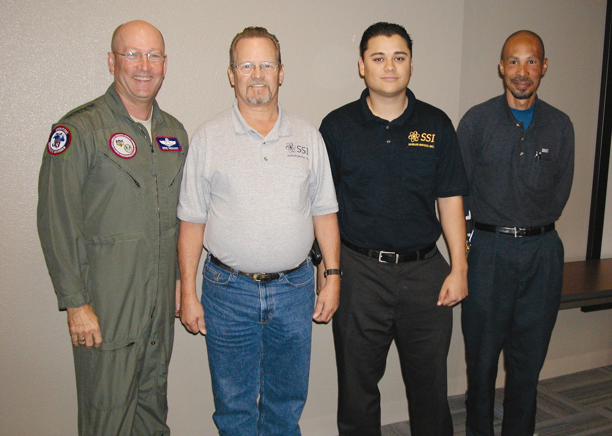 Gen. Gene Renuart, commander of U.S. Northern Command, came to March
Air Reserve Base Nov. 14, to thank employees for their involvement in supporting NORTHCOM and FEMA during the recent Southern California fires. Pictured is Gen. Renuart and Satellite Systems, Inc.’s Dale Ahlbom, Carlos Fierra and Chris Long.  During a presentation, the commander watched a video of March’s efforts during the fires, put together by the 4th Combat Camera Squadron, and then presented individuals from various sections with his personal coin.  (U.S. Air Force photo)

The recipients are --
452nd Air Mobility Wing
1Lt Faith Eudy
TSgt Patricia Littles
SrA David Flaherty

452nd Operations Group
Capt Ryan Van Scotter
Capt Seth Ewalt
SMSgt Charlie Brown
TSgt Lance Augustin

452nd Maintenance Group
TSgt George Uvillado
SSgt David Holloway
SrA Austin Archey

452nd Medical Group
Col Raymond (Mike) Butler
CMSgt Lou Ellis

452nd Mission Support Group
Maj Eddy Palacios
SMSgt Russ LaBelle
Mr Marv Tucker

4th Combat Camera Sq.
MSgt Thomas Coffin
TSgt Roy Santana
SSgt Hector Garcia

304th Sustainment Brigade
1Lt Eric Jolley
PFC Brian Wolfman
SPC Tracy Ellingsen

Satellite Systems, Inc.
Mr Carlos Fierra
Mr Dale Ahlbom
Mr Chris Long

 


