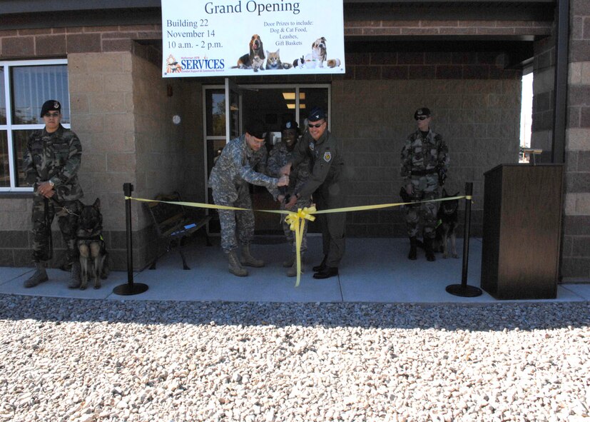 A ribbon cutting ceremony takes place for the new veterinary clinic on Holloman Air Force Base, New Mexico, November 14, 2007. The new clinic was built for improved care of military working dogs.
(U.S. Air Force photo/ Airman 1st Class Rachel A Kocin)
