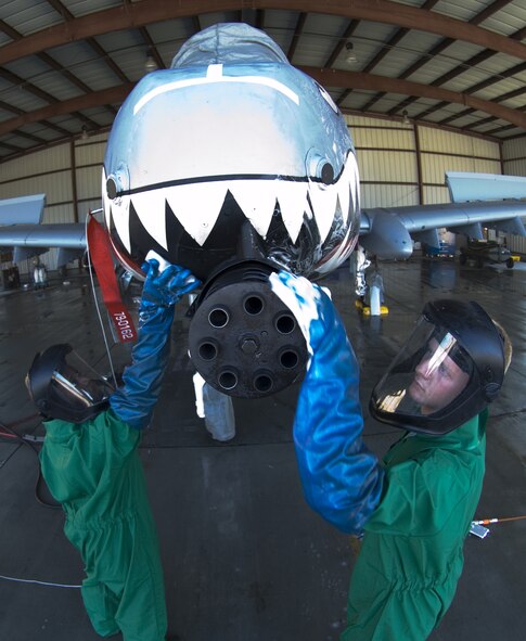 MOODY AIR FORCE BASE, Ga. -- Senior Airman Michael Holmes and Airman 1st Class Joshua Norris, 23rd Aircraft Maintenance Squadron, wash an A-10C Thunderbolt II Nov. 19 at moody’s corrosion control wash rack. The A-10C Thunderbolt receives a thorough wash-down and lubrication every three months to prevent corrosion and inspect for surface damage. (U.S. Air Force photo by Senior Airman Elizabeth Rissmiller)
