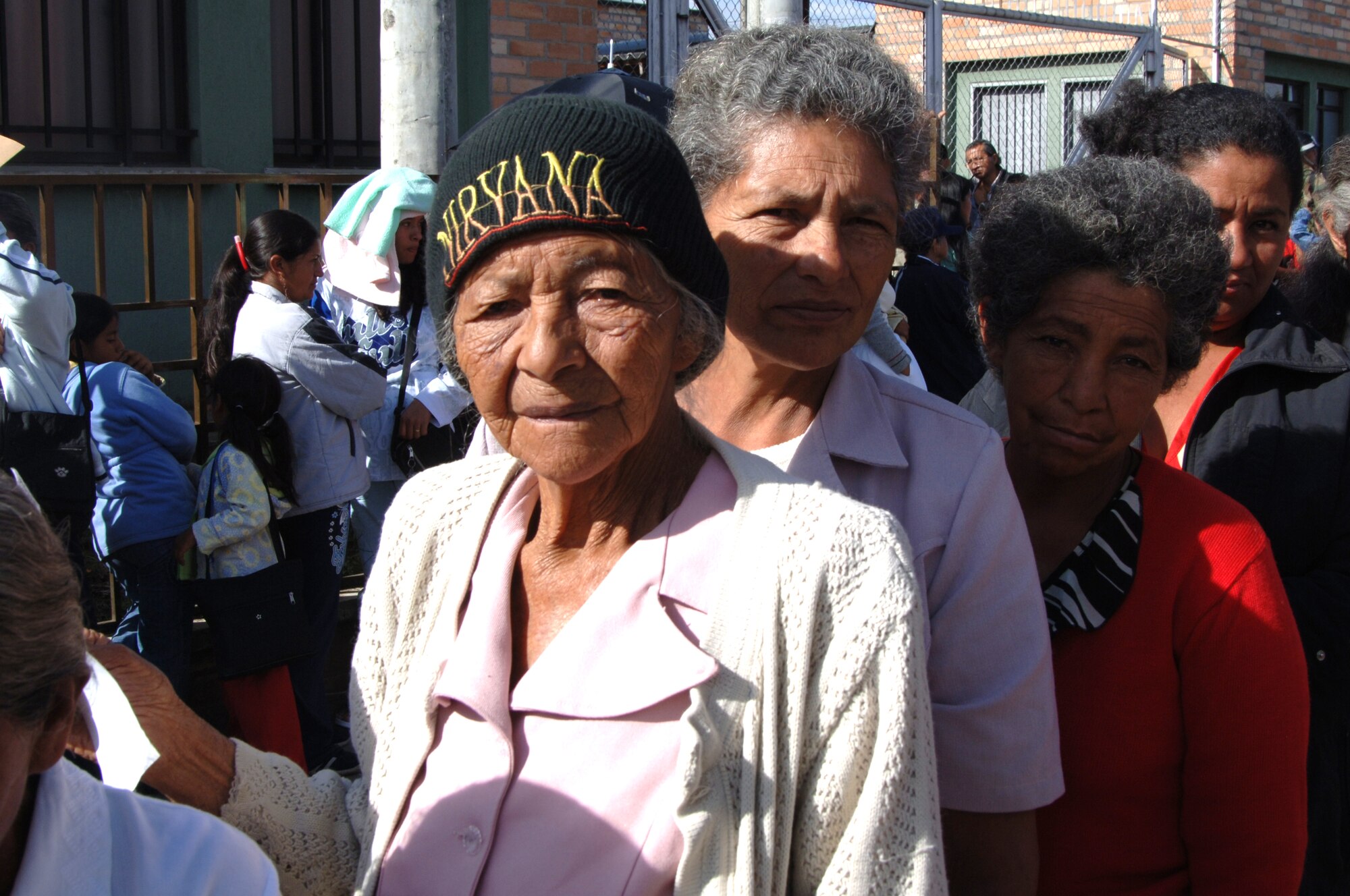 A family of Colombian women stand in line awaiting treatment by U.S. Airmen in Popayan, Colombia.  Military members were on hand to provide comprehensive medical care to more than 4,000 impoverished citizens during the two-week humanitarian mission.  Colombian President Alvaro Uribe recognized the combined efforts of Airmen, Soldiers, Sailors and Marines during a ceremony in Bogota, Colombia, Nov. 14th, where he presented the “Air Force Cross for Aeronautical Merit — Grand Cross Category” medal to Lt. Gen. Norman Seip, 12th Air Force and Air Forces Southern commander.  General Seip accepted the award on behalf of the hundreds of military members who have deployed to Colombia to support humanitarian, military cooperation and counter-narcotics missions.

