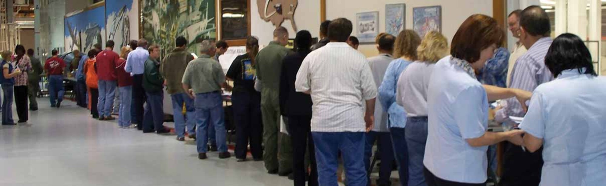 Hundreds of Oklahoma City Air Logistics Center employees lined up near Hollywood and Vine in Bldg. 3001 on Wingman Day to learn more about Tinker's helping agencies available to them and their families. (Courtesy photo)
