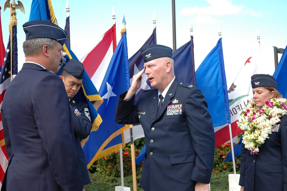Col. John L. Morris, new 624th Regional Support Group commander,  salutes Maj. Gen. Robert E. Duignan, 4th Air Force Commander, during the change of command ceremony at Hickam AFB, Hawaii.  (U.S. Air Force photo/Staff Sgt. Jennifer Chamberlin)