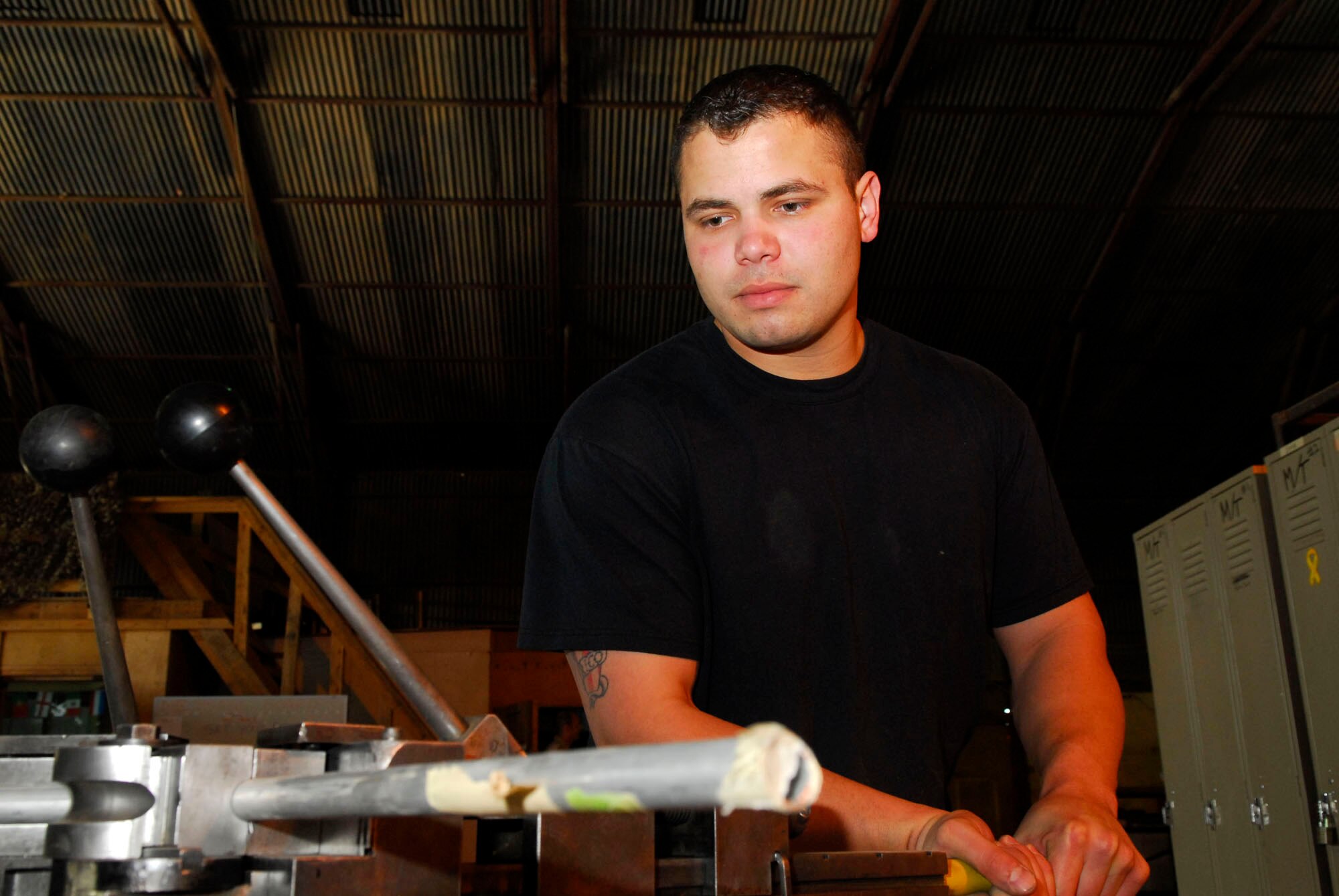 Staff Sgt. Adrian Lopez creates a hydraulic line for a C-130 Hercules using a tube bender Nov. 14 at Balad Air Base, Iraq. The fabrication shop creates many items from scratch for all military vehicles including Army assets. Sergeant Lopez is a 332nd Expeditionary Maintenance Squadron aircraft structural maintainer and is deployed from Spangdahlem Air Base, Germany. (U.S. Air Force photo/Joshua Garcia)
