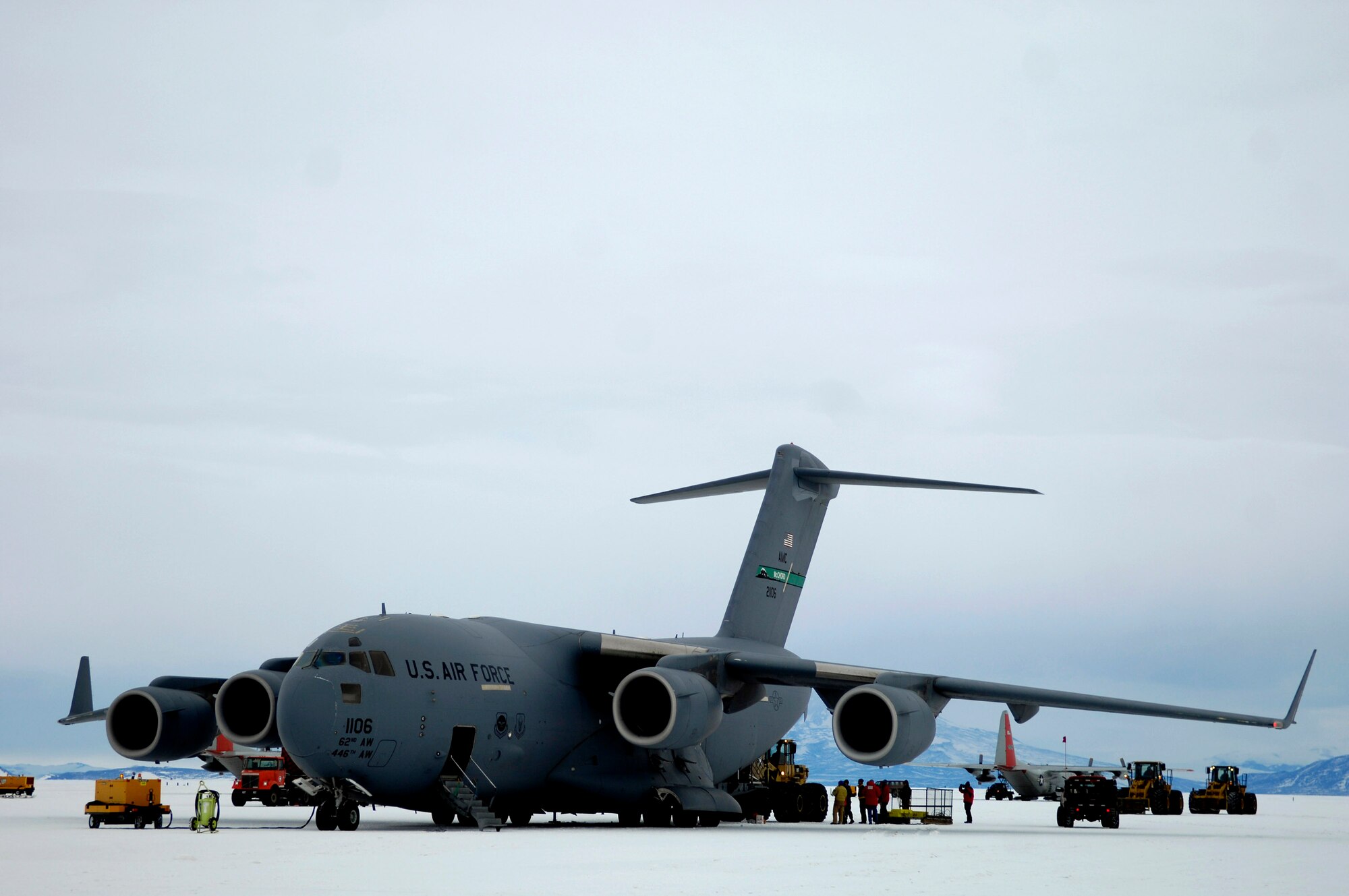 Equipment is offloaded from a C-17 Globemaster III Nov. 22 at McMurdo Station, Antarctica.  Reserve and active duty Airmen from McChord Air Force Base, Wash., are staging at Christchurch, New Zealand, to support the 13th Air Force-led Joint Task Force Support Forces Antarctica's Operation Deep Freeze. (U.S. Air Force photo/Tech. Sgt. Shane A. Cuomo)