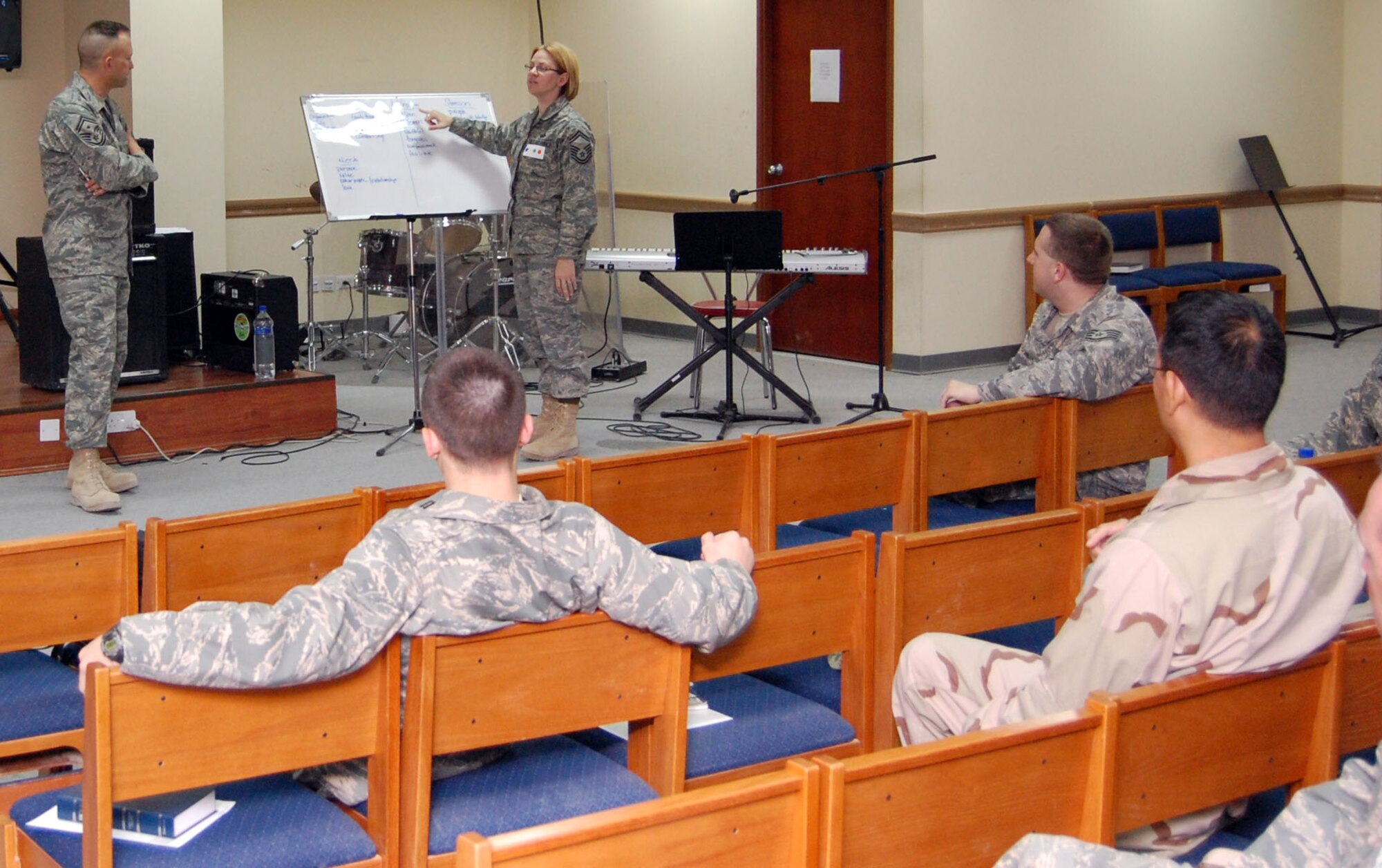 SOUTHWEST ASIA- Senior Master Sgt. Tammy Brangard-Hern, 386th Expeditionary Mission Support Group personnel contingency operations superintendent, explains to the class the pros and cons of a primarily blue personality Nov. 20 in the base chapel. Sergeant Bangard-Hern is stationed at Randolph Air Force Base, Texas.