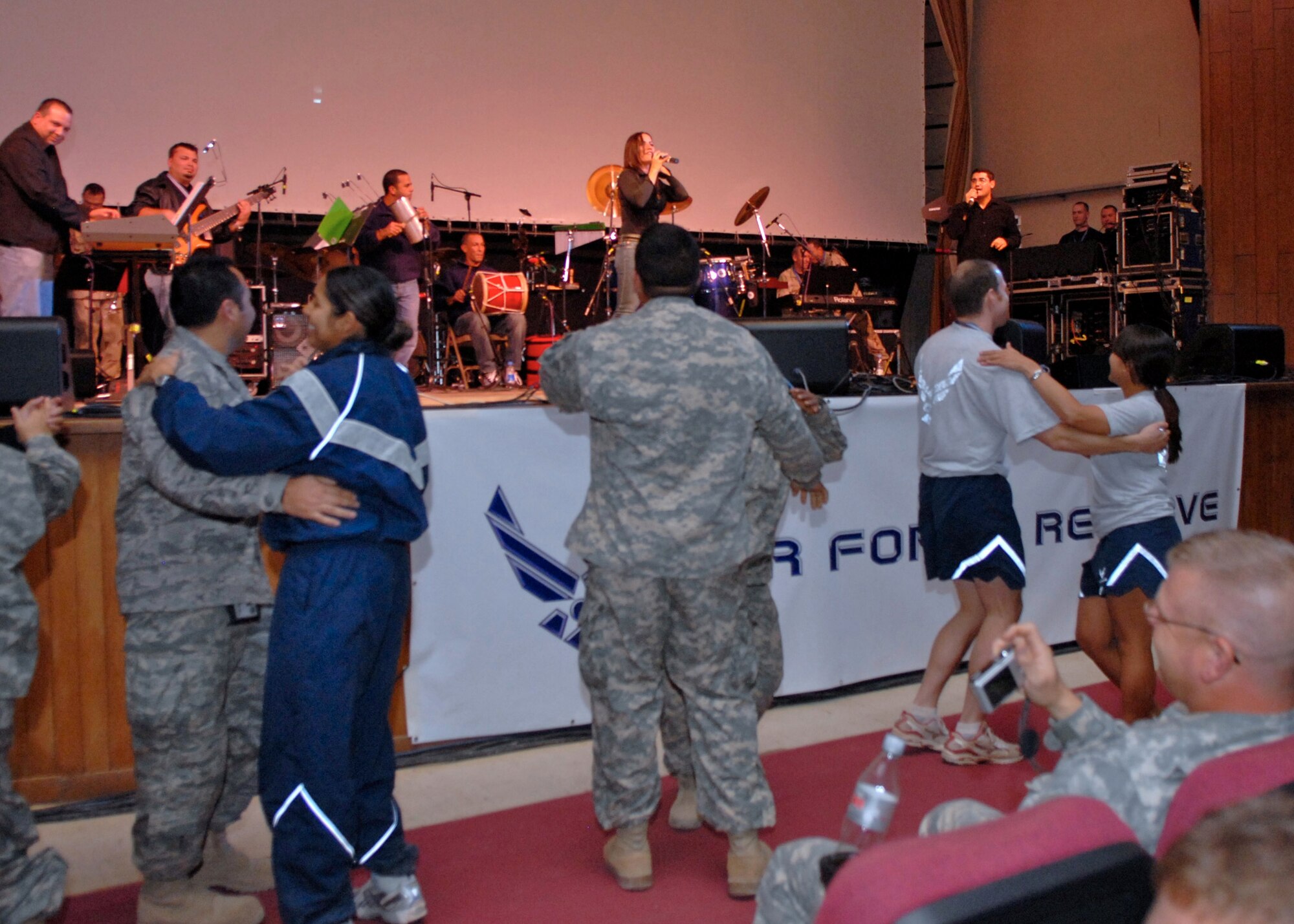 Servicemembers showed off their Merengue dance styles during Melina Leon's performance at Balad Air Base, Iraq, Nov. 23.  (U.S. Air Force photo/Ken Hackman)
