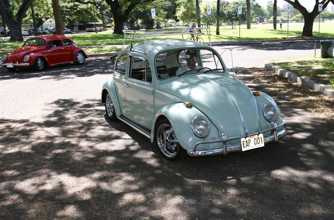 Classic Volkswagen Bugs rode as part of the 33rd annual Classic Car Cruiser event which supported the Toys for Tots drive Nov. 25. There were over 100 vehicles that cruised down Waikiki beargifts for the disadvantaged children.