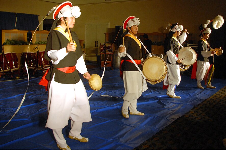 KUNSAN AIR BASE, South Korea– The GwangDae performance group from Gunsan City, South Korea, performs for Airmen here Nov. 23.  The group performed as part of Kunsan’s Good Neighbor Program and gave Airmen a chance to learn about Korean music and culture.  (U.S. Air Force photo/Senior Airman Giang Nguyen)

