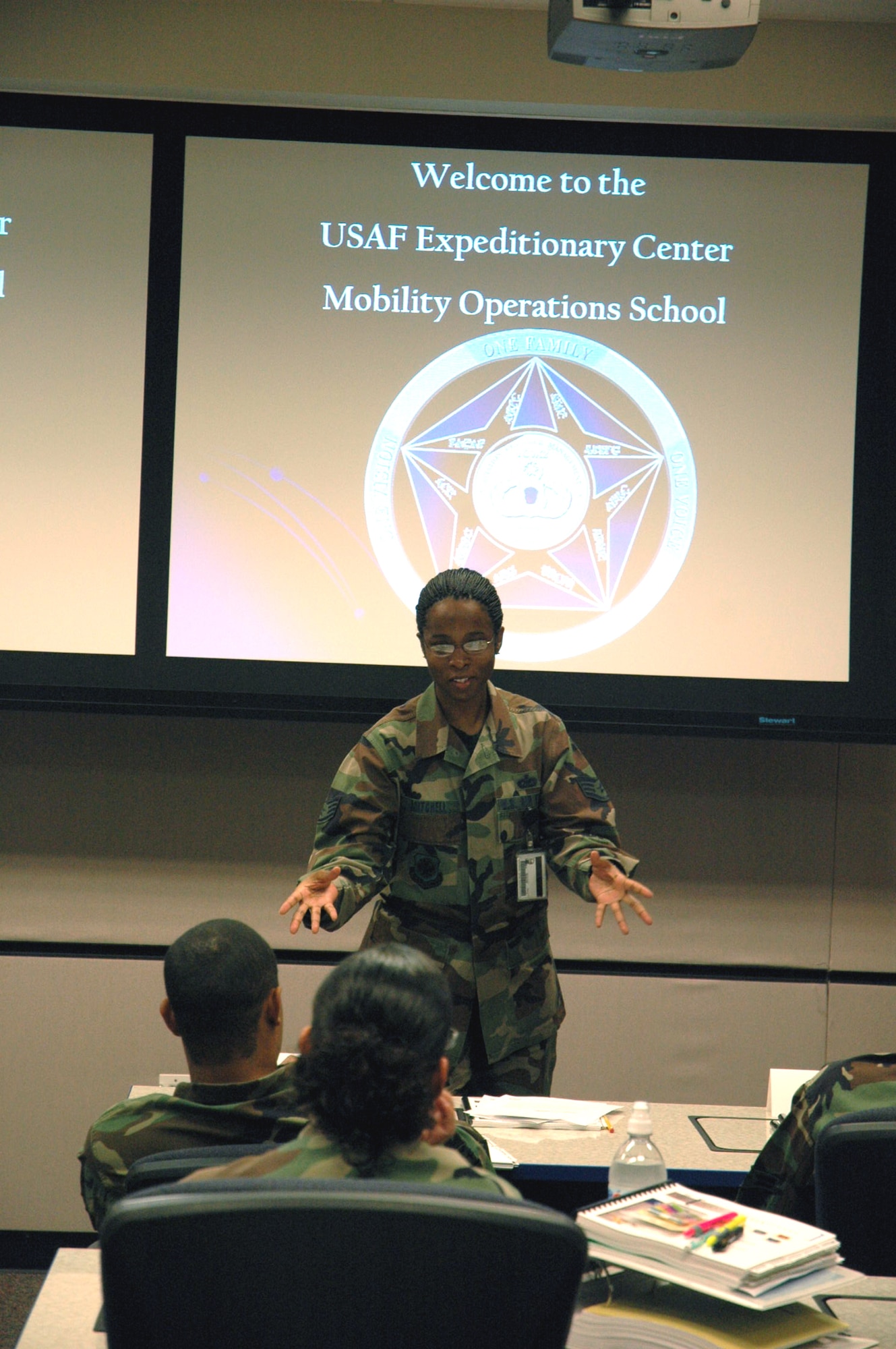 U.S. Air Force Staff Sgt. Khadejah Mitchell, an aviation resource management instructor for the U.S. Air Force Expeditionary Center's Mobility Operations School, begins a new class Sept. 11, 2007, at the USAF EC on Fort Dix, N.J.  (U.S. Air Force Photo/Tech. Sgt. Scott T. Sturkol)