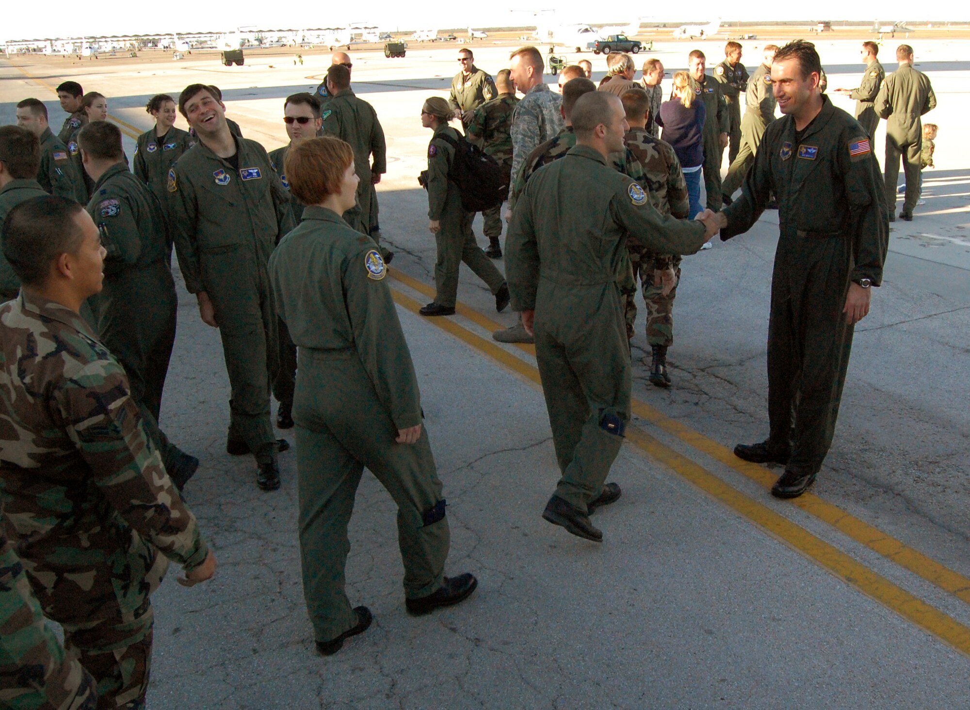 LAUGHLIN AIR FORCE BASE, Texas – Laughlin well wishers congratulate Col. Mike Minahan, 47th Flying Training Wing commander, after his final flight Nov. 26. Colonel Minahan was recently selected as Executive Officer to U.S. European Command Deputy Commander Vice Admiral Richard Gallagher at USEUCOM Headquarters in Stuttgart, Germany. Col. Minahan will soon depart Laughlin for Germany after almost two years of command. (U.S. Air Force photo by Senior Airman Olufemi Owolabi)