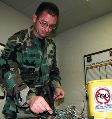 Master Sgt. Marion Lollis, 919th Maintenance Group aircraft quality assurance inspector, inspects foreign object damage items members collected from the flight line. Sergeant Lollis was one of four members recognized as a "Superior Performer" during the Maintenance Standardization and Evaluation Program inspection held Oct. 31 - Nov. 4. The 919th MXG broke an  MSEP inspection score record when they earned a rating of "Excellent" in  Personnel Evaluations - the highest rating received to date in that area by an Air Force Reserve Command maintenance unit. 