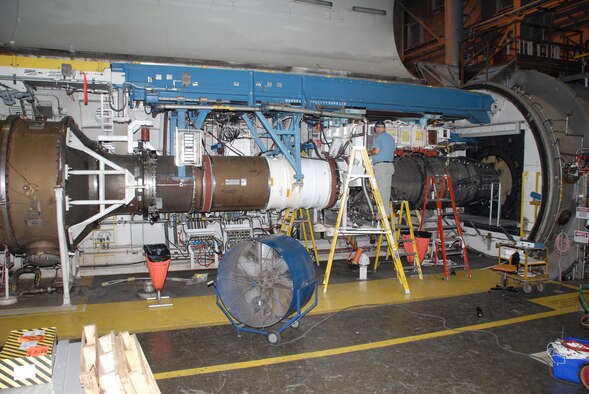 A test technician prepares the General Electric F101 engine for testing at Arnold Engineering Development Center at Arnold Air Force Base, Tenn. The F101 engine is slated to be the first high-performance, supersonic engine to be certified to run on a 50-50 blend of Fisher-Tropsch synthetic fuel and JP-8 fuel. (Air Force photo)