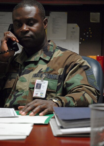 KUNSAN AIR BASE, South Korea—  Chief Master Sgt. Eric Harmon, 8th Medical Group superintendent, takes a phone call here Nov. 27. Chief Harmon has been selected to be the new command chief for the 72nd Air Base Wing at Tinker AFB, Okla. (U.S. Air Force Photo/Staff Sgt. Araceli Alarcon) 


