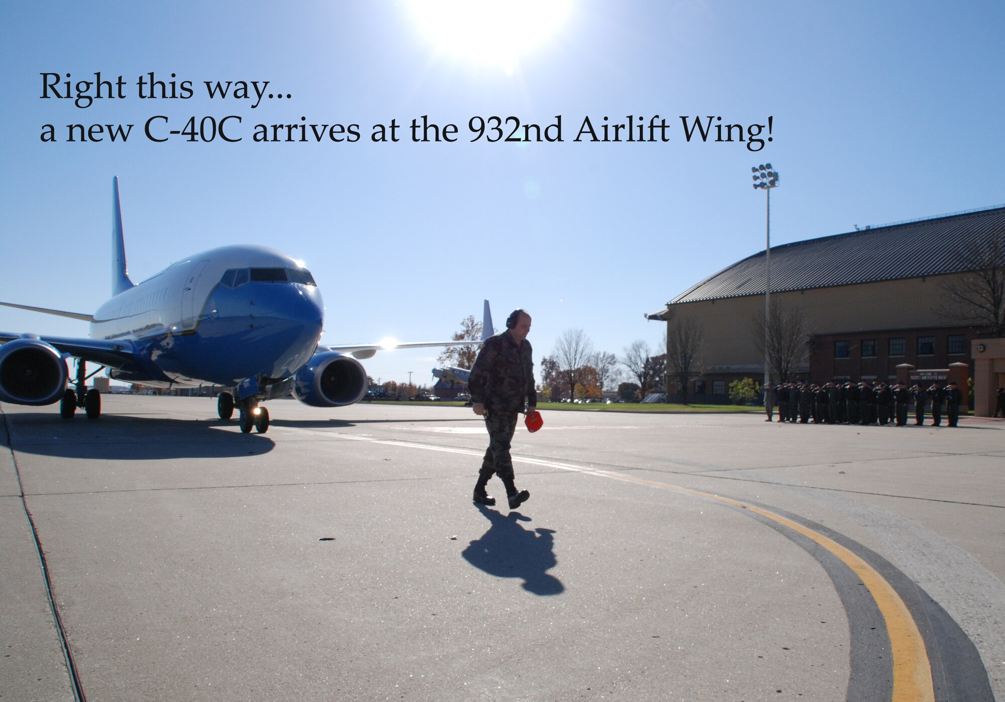 The sun reflected brightly off the newly painted Air Force Reserve Command aircraft belonging to the 932nd Airlift Wing.  Maintanence guided the newest C-40C plane to the spot outside base operations. The C-40 plane has a paint design similar to Air Force One. 

General C40 Characteristics 
Primary Function: High-priority personnel transport 
Power Plant: Two GE CFM 56-7B27 turbofan engines 
Thrust: 27,000 pounds static thrust each engine 
Length: 110 feet, 4 inches (33.6 meters) 
Height: 41 feet, 2 inches (12.5 meters) 
Maximum Takeoff Weight: 171,000 pounds 
Wingspan: 117 feet, 5 inches (35.8 meters) 
Speed: 530 mph (Mach 0.8) 
Ceiling: 41,000 feet (12,727 meters) 
Fuel Capability: 60,000 lbs 
Maximum Range: 4,500 to 5,000 nautical miles (based on payload) unrefueled range 
Maximum Load: C-40C: 42 passengers 
Crew:10 (varies with model and mission) 

As part of the Air Force Total Force Integration initiatives, the Air Force established an active associate unit with Air Force Reserve Command's 932nd Airlift Wing at Scott Air Force Base, Ill., earlier this year. This means some of the flight attendants and pilots on the 932nd AW's aircraft will be active duty Air Force members from the 375th Operations Group. 

Col. Maryanne Miller, 932nd AW commander is proud of Airmen, both active duty and reserve. 

"This was a total effort by the 932nd and the 375th crews from the beginning," she said. "Being fully integrated in the DV mission has been and will continue to be the most effective way to provide full support to the customer." 

From 1969 to 2003, personnel from the 932nd and 375th airlift wings worked side by side performing aeromedical evacuation missions aboard the now retired C-9A Nightingale. When the 932nd changed its mission to DV airlift in 2003 with three new C-9C aircraft, the close relationship between the two wings was put on hold. 

With the C-40C, Air Force Reserve and active duty crews will once again work together performing