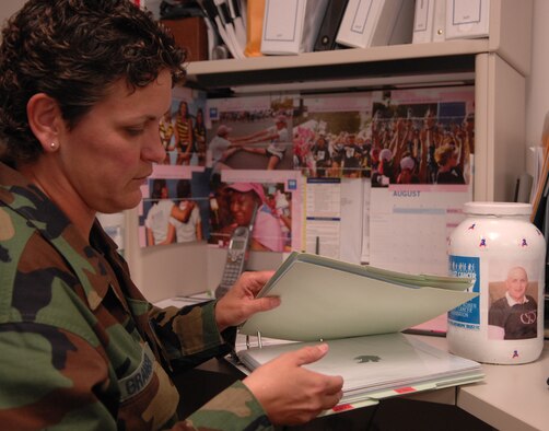 Tech. Sgt. Marsha Granger, 820th RED HORSE Squadron, proudly displays her "Pink Pride" after surviving her battle with breast cancer. Sgt. Granger actively participates in breast cancer fund raisers geared to educating the public and support those fighting to survive. (U.S. Air Force photo by Senior Airman Nadine Y. Barclay)