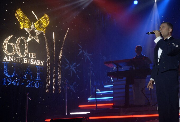 Senior Airman Nicholas Amari, Air Force Tops in Blue performer, sings one of the final songs to conclude the Air Force Tops in Blue performance at the North Charleston Performing Arts Center Nov. 24. (U.S. Air Force photo/Staff Sgt. April Quintanilla)
