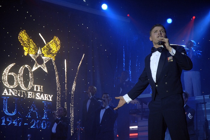 Senior Airman Jonathan Hayden, Air Force Tops in Blue performer, sings one of the final songs concluding the Air Force Tops in Blue performance at the North Charleston Performing Arts Center Nov. 24. The Air Force Tops in Blue serves as an expeditionary entertainment unit that provides entertainment to Air Force Airmen and their families world wide. (U.S. Air Force photo/Staff Sgt. April Quintanilla)
