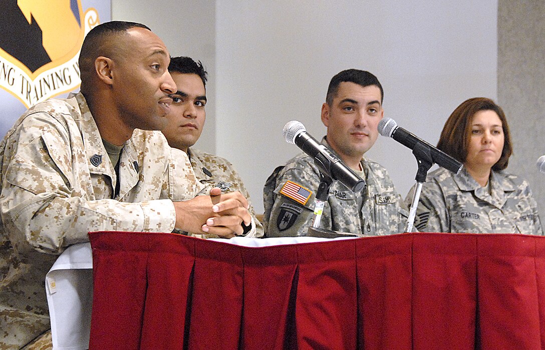 It's rare to see military members deploy to an environment that doesn't inlcude a mixture of sister services. Team Sheppard members representing the Air Force, Army, Navy and Marines shared their thoughts during a Nov. 16 Lunch 'N Learn. Marine Gunnery Sgt. Charles Lazard, pictured left, answers questions during the luncheon regarding his deployment to Iraq. Also pictured, from left to right, inlcud Navy Hospitalman 3rd Class Robert Rubio, 381st Training Squadron, Army Staff Sgt. John Hrabar, 381st TRS, and Air Force Master Sgt. Angela Carter, 82nd Medical Operations Squadron. (U.S. Air Force photo/Harry Tonemah)