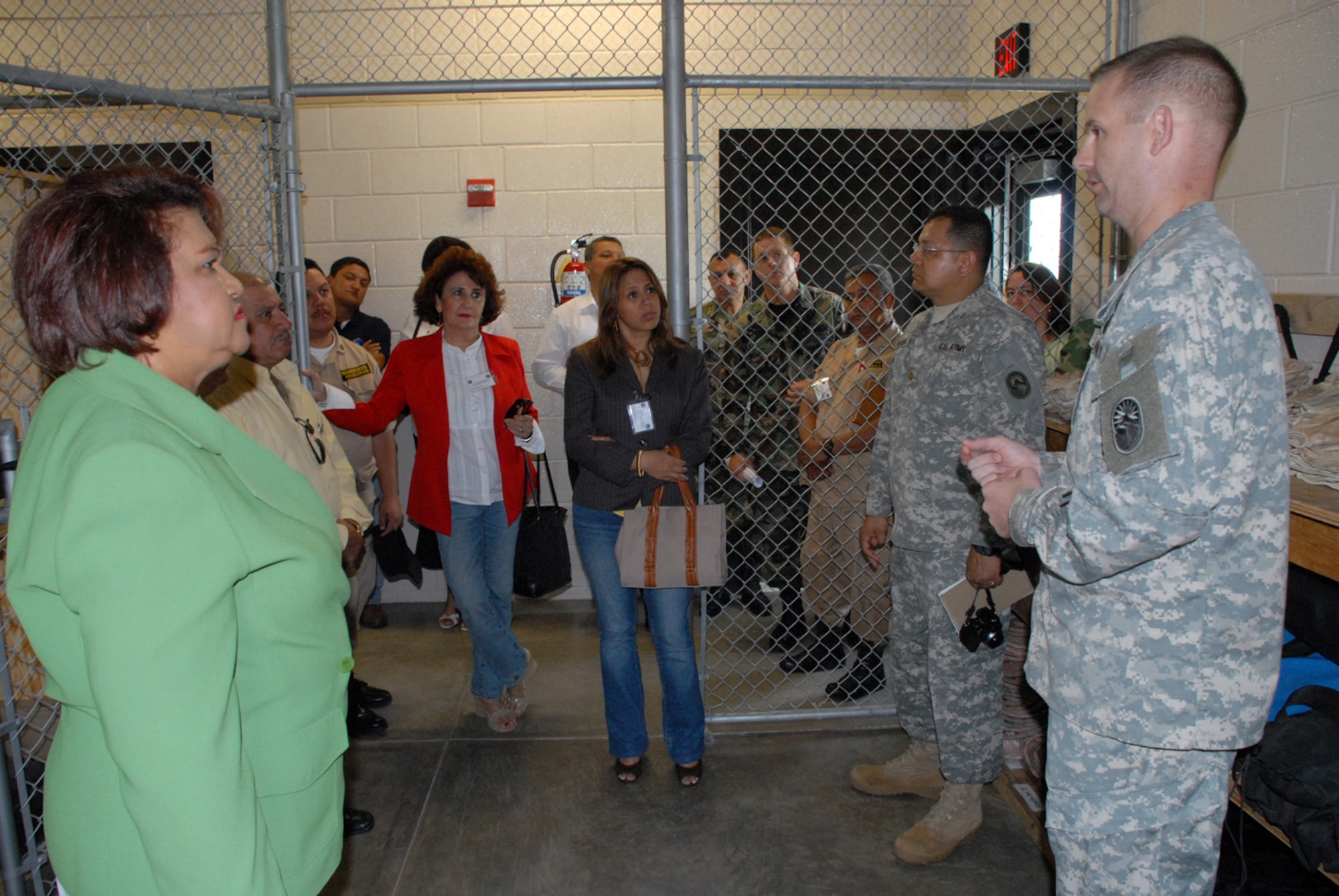 SOTO CANO AIR BASE, Honduras -- Army Lt. Col. Gregory Jicha, Army Forces commander here, talks about the unit’s search and rescue capabilities and equipment that benefit Honduras and countries throughout Central America during Local Leaders Day here Nov. 27.  The annual event brought together not only Honduran government leaders, but also representatives from the U.S. Embassy, World Food Program, and the U.S. Agency for International Development.  (U.S. Air Force photo/Tech. Sgt. Sonny Cohrs)