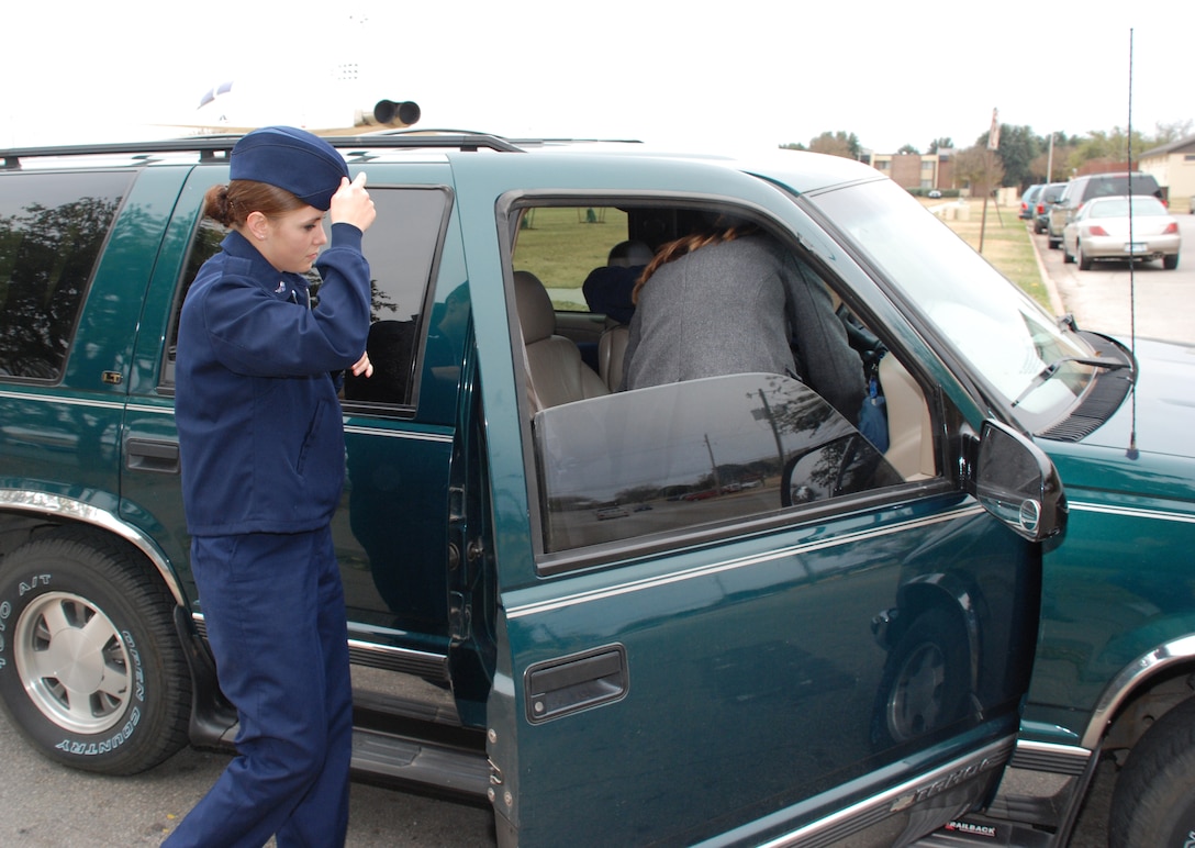 Airman 1st Class Mikayla McCoy, an Airman in Training with the 382nd Training Squadron, gets in the car with local arean resident Wendy Mcikhaney Nov. 22 at the Solid Rock Cafe. Airman McCoy joined almost 400 other AIT in joining local area families as part of Operation Thanksgiving. (U.S. Air Force photo/Airman 1st Class Jacob Corbin)