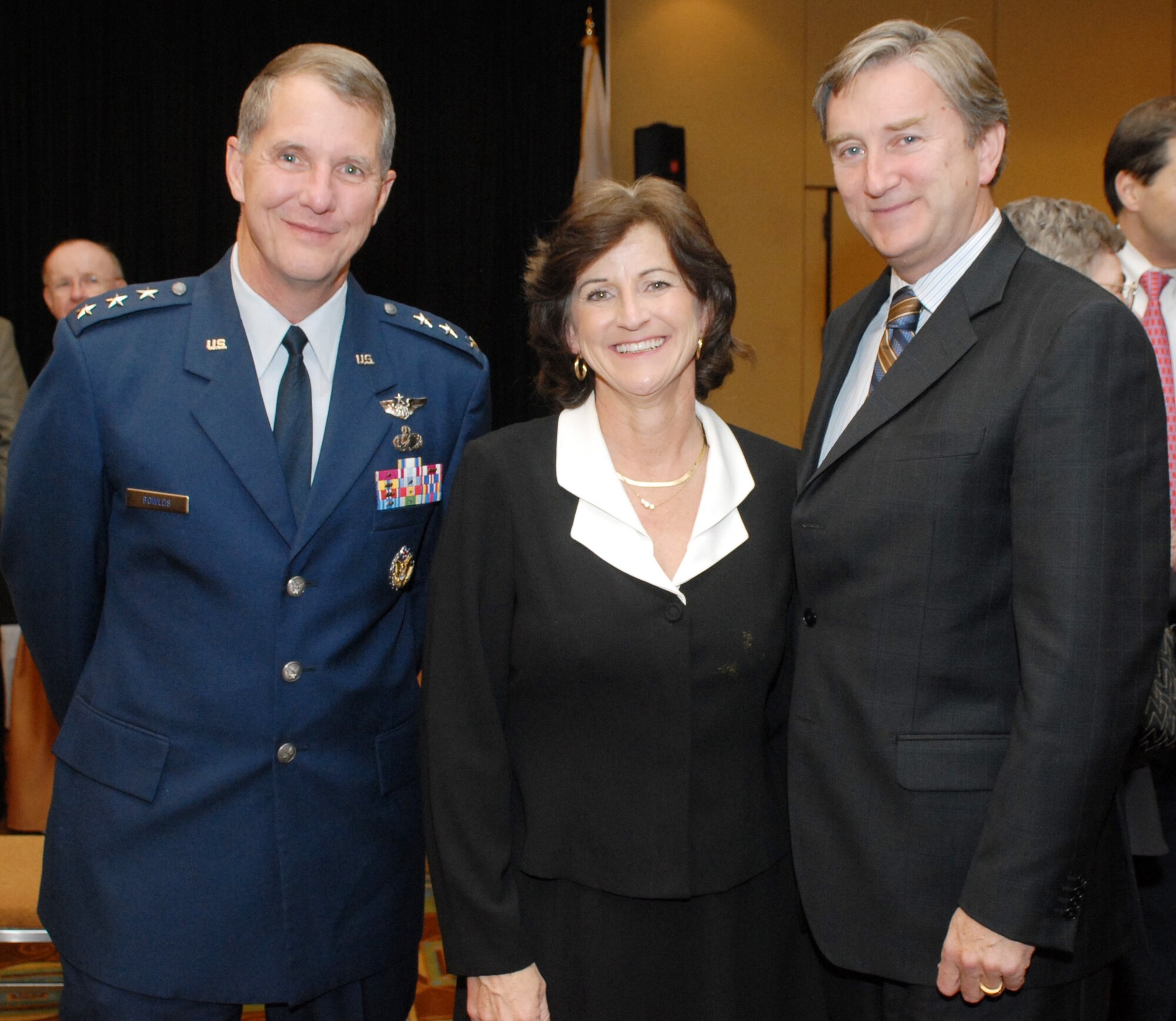 Electronic Systems Center Commander Lt. Gen. Ted Bowlds and his wife, Marcia, meet with U.S. Rep. John Tierney (D-Mass.) at the North Suburban Chamber of Commerce annual meeting and dinner Nov. 19 at the Hyatt Hotel in Woburn, Mass.  Congressman Tierney, who represents the Sixth District, was guest speaker at the chamber event. (Photo by Joe Brown.)
